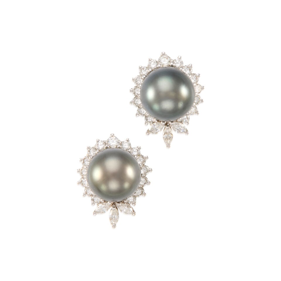 A PAIR OF WHITE GOLD, CULTURED PEARL, AND DIAMOND EARRINGS: A PAIR OF WHITE GOLD, CULTURED PEARL, AND DIAMOND EARRINGS • 14K and 18K white gold • Two cultured pearls measuring approximately 11.64mm in diameter • Six marquise shaped diamonds