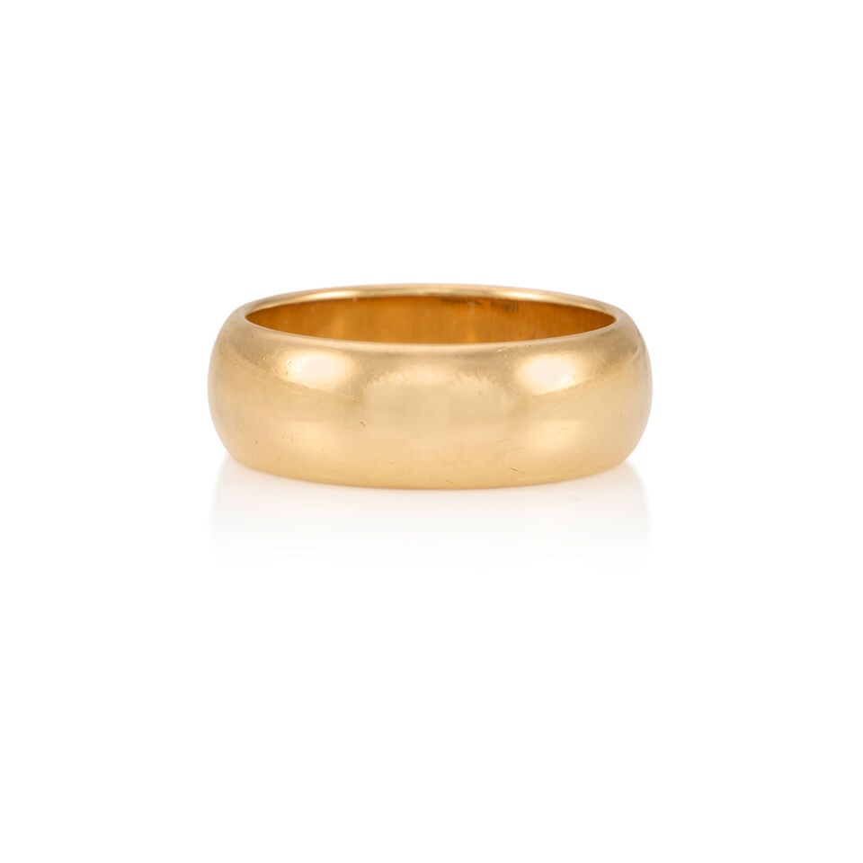 TIFFANY & CO.: A 14K YELLOW GOLD BAND: TIFFANY & CO.: A 14K YELLOW GOLD BAND • Stamped TIFFANY & CO, with serial number • Size 7 3/4 • Estimated gross weight: 9.1 grams Footnotes: OVERALL CONDITION: good Metal purity