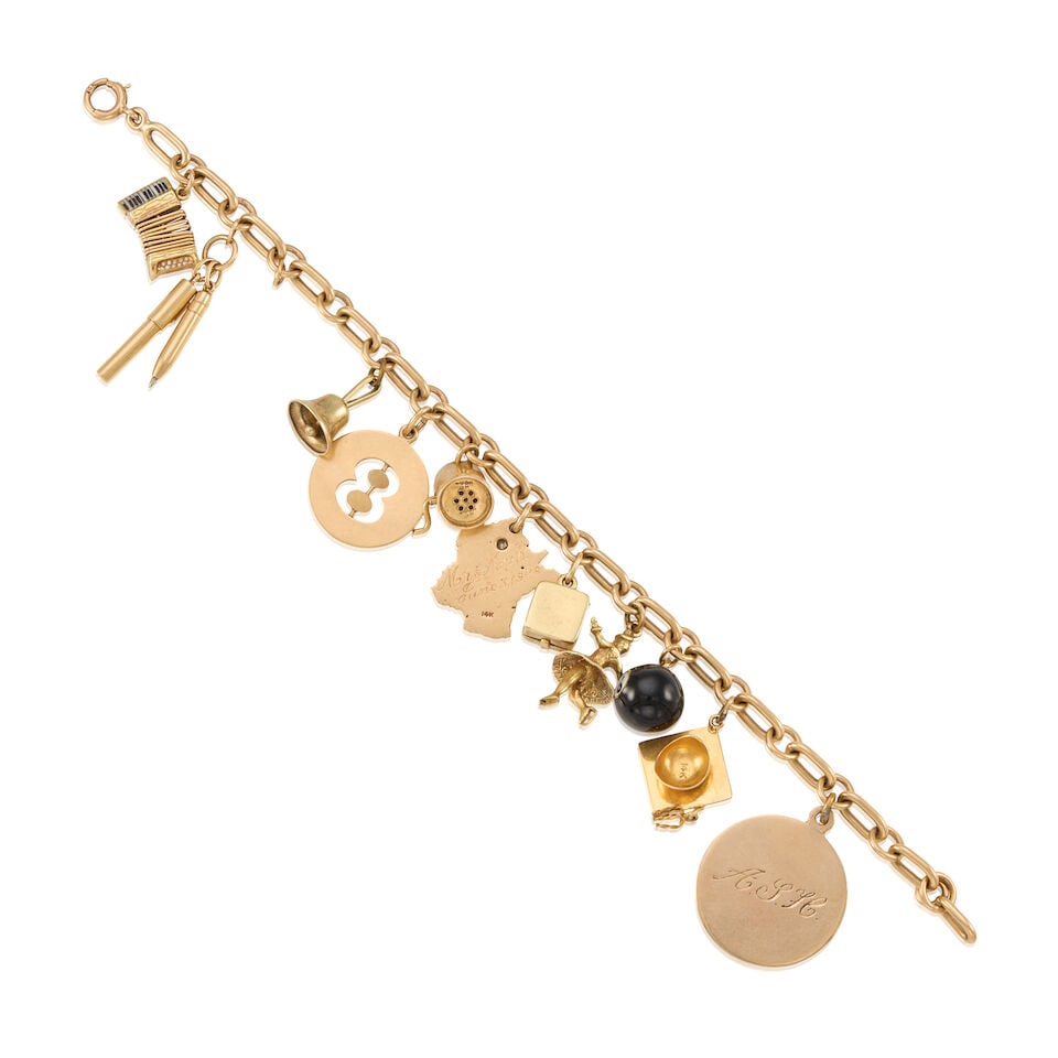 A GOLD CHARM BRACELET - 2