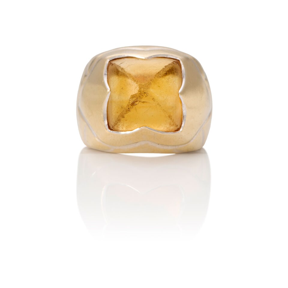 BULGARI: A CITRINE PYRAMID RING: BULGARI: A CITRINE PYRAMID RING • A pyramid shaped citrine measuring approximately 12.23mm x 11.88mm x 7.51mm • Stamped BVLGARI • Size 8 1/2 • Estimated gross weight: 16.1