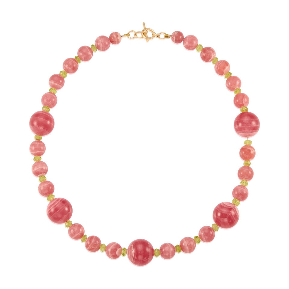 A 11K YELLOW GOLD, RHODOCHROSITE, AND PERIDOT NECKLACE: A 11K YELLOW GOLD, RHODOCHROSITE, AND PERIDOT NECKLACE • Numerous round and drilled rhodochrosite beads measuring from 8.22mm to 16.32mm in diameter • Numerous round and faceted drilled pe