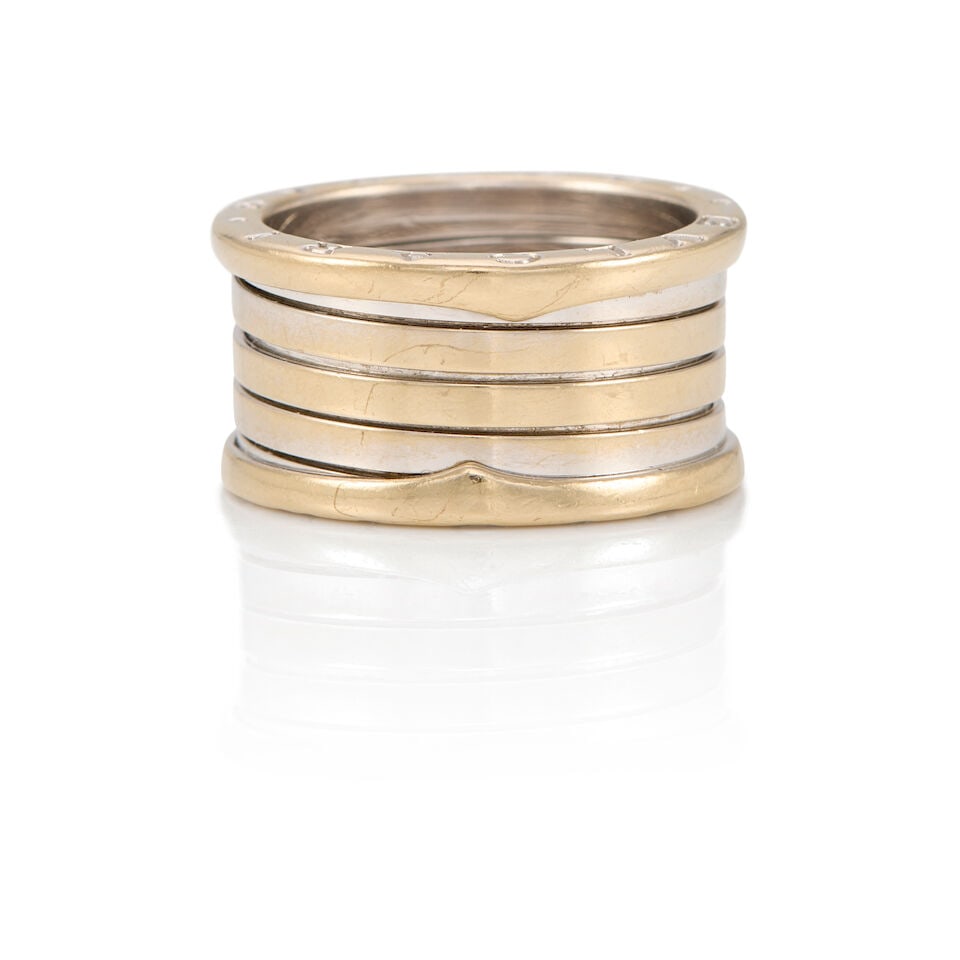 BULGARI: A 18K WHITE GOLD B.ZERO1 RING: BULGARI: A 18K WHITE GOLD B.ZERO1 RING • Stamped BVLGARI • Size 9 • Estimated gross weight: 12.2 grams Footnotes: OVERALL CONDITION: good Metal purity stamped and tested with XRF