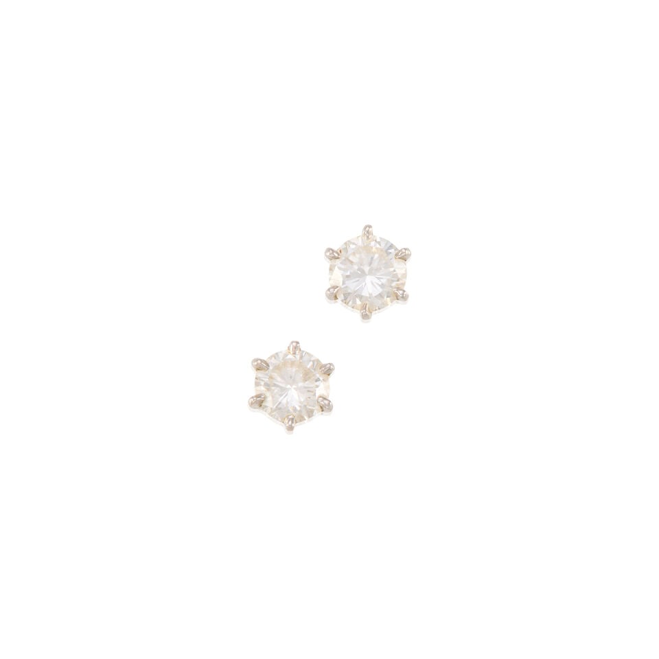 13K WHITE GOLD AND DIAMOND STUD EARRINGS: 13K WHITE GOLD AND DIAMOND STUD EARRINGS • Two round brilliant cut diamonds weighing approximately 1 carat total • Measures 5/8 in. x 1/4 in. • Estimated gross weight: 1.4