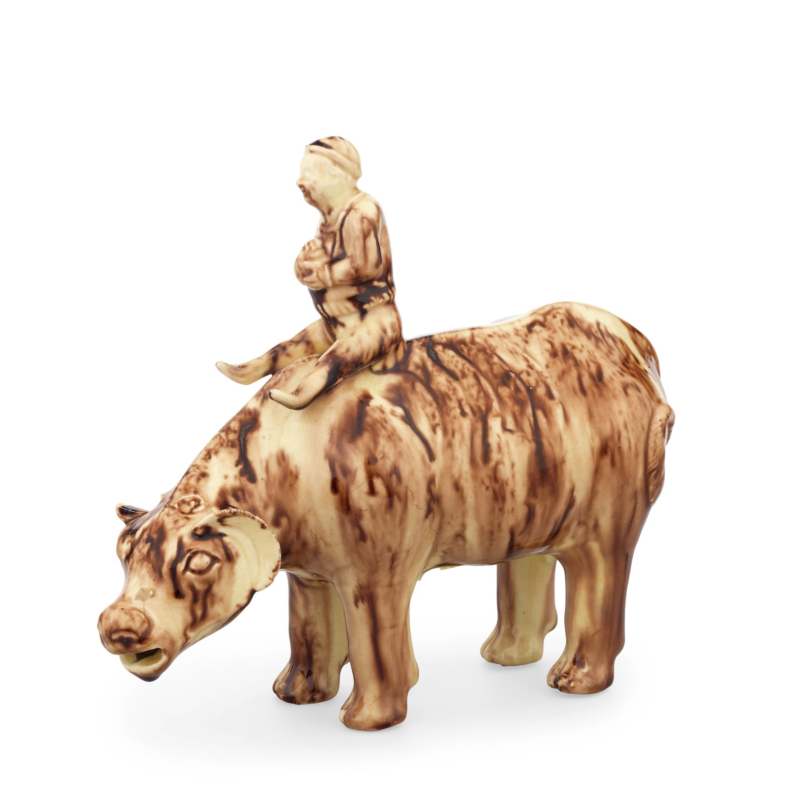 A Staffordshire Whieldon type creamware model of a boy riding a water buffalo, circa 1755-60: A Staffordshire Whieldon type creamware model of a boy riding a water buffalo, circa 1755-60 After a Chinese original, the animal naturalistically modelled without a base, standing with its head lower