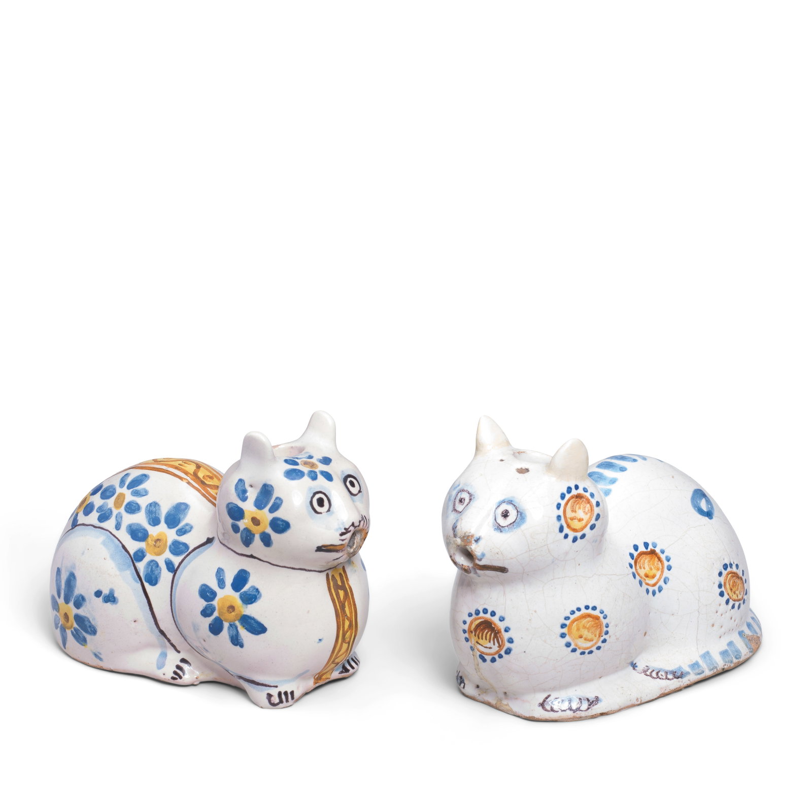 Two zoomorphic Nevers faience pouring vessels modelled as recumbent cats, late 17th century (1 of 1)