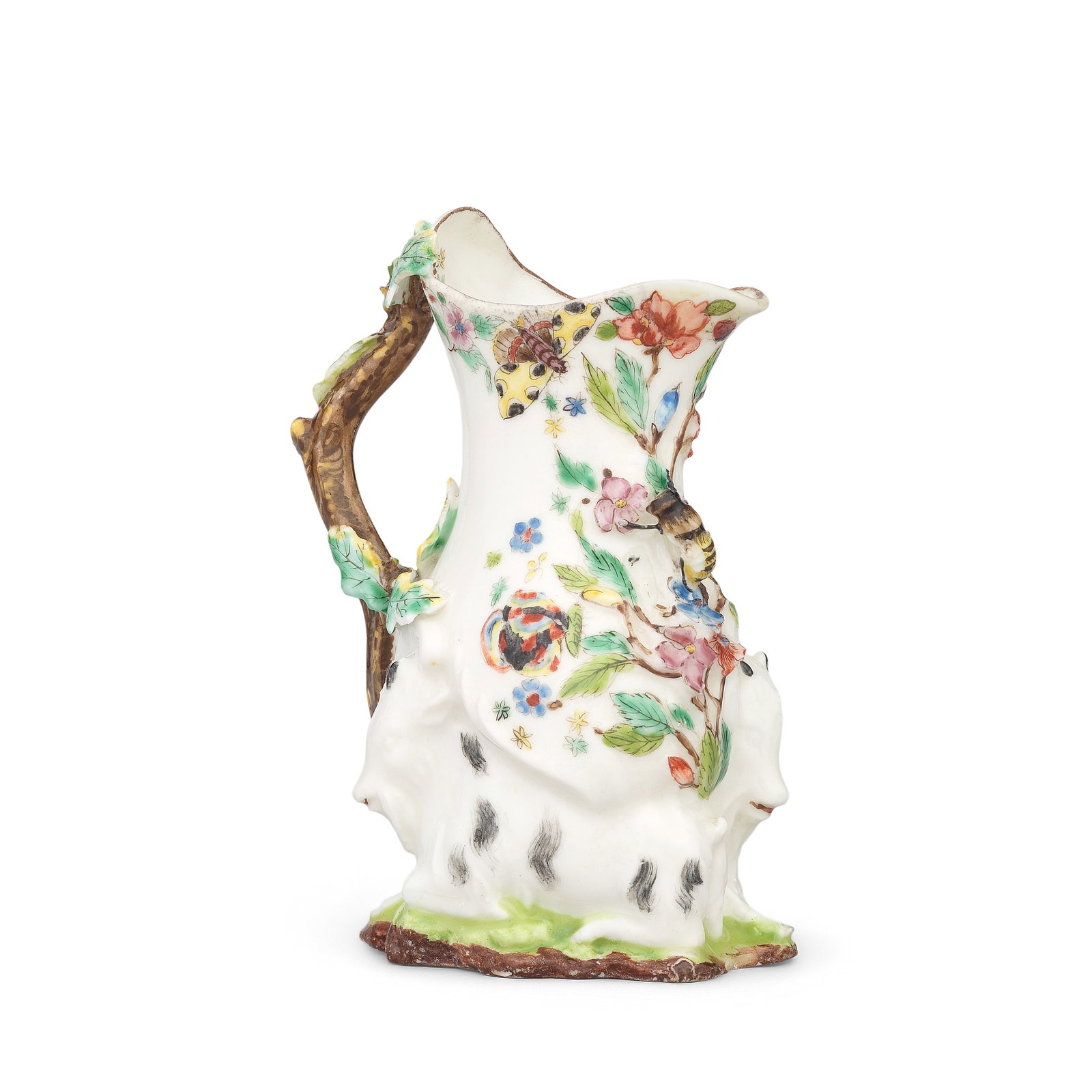 A Chelsea 'Goat and Bee' jug, circa 1745-47: A Chelsea 'Goat and Bee' jug, circa 1745-47 Of pear shape, supported by two goats recumbent nose to tail on grass, applied in high relief with a finely modelled and naturalistically coloured bee, set 