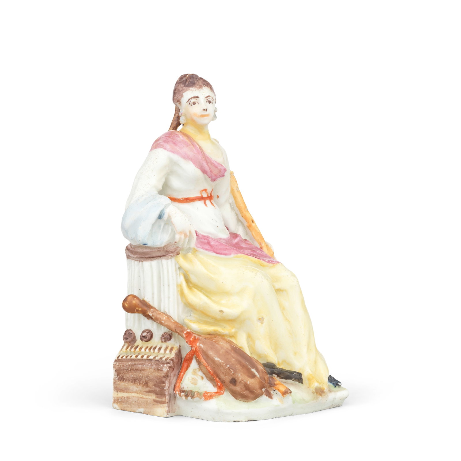 A Bow figure of the muse Euterpe, circa 1750-54: A Bow figure of the muse Euterpe, circa 1750-54 By the 'Muses Modeller', seated with her right arm resting on an organ with masked stops above the keys, and the inscription 'Euterpe for the musical in