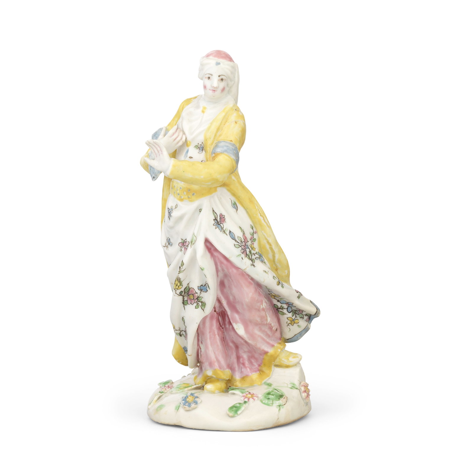 A rare Liverpool (Samuel Gilbody) figure of a lady in Turkish costume, circa 1758-60: A rare Liverpool (Samuel Gilbody) figure of a lady in Turkish costume, circa 1758-60 after the Meissen original by Johann Joachim Kändler, standing in a dancing pose with her left arm raised, wea