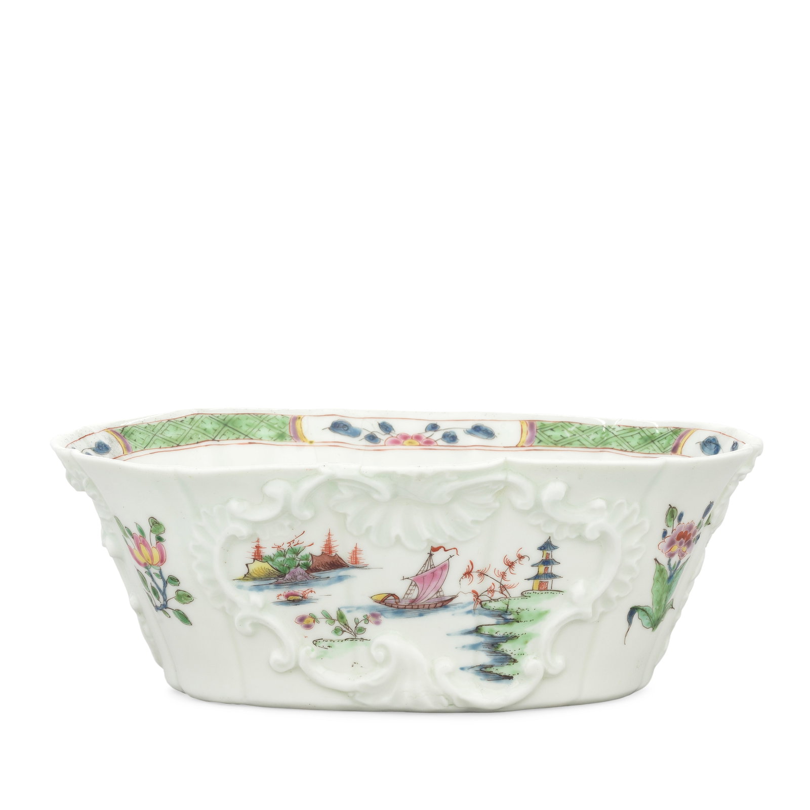 An exceptional Worcester potting pot, circa 1752-53: An exceptional Worcester potting pot, circa 1752-53 Of spreading oval shape with twelve vertical flutes, crisply moulded with a slightly different rococo cartouche on both sides, further rococo orname