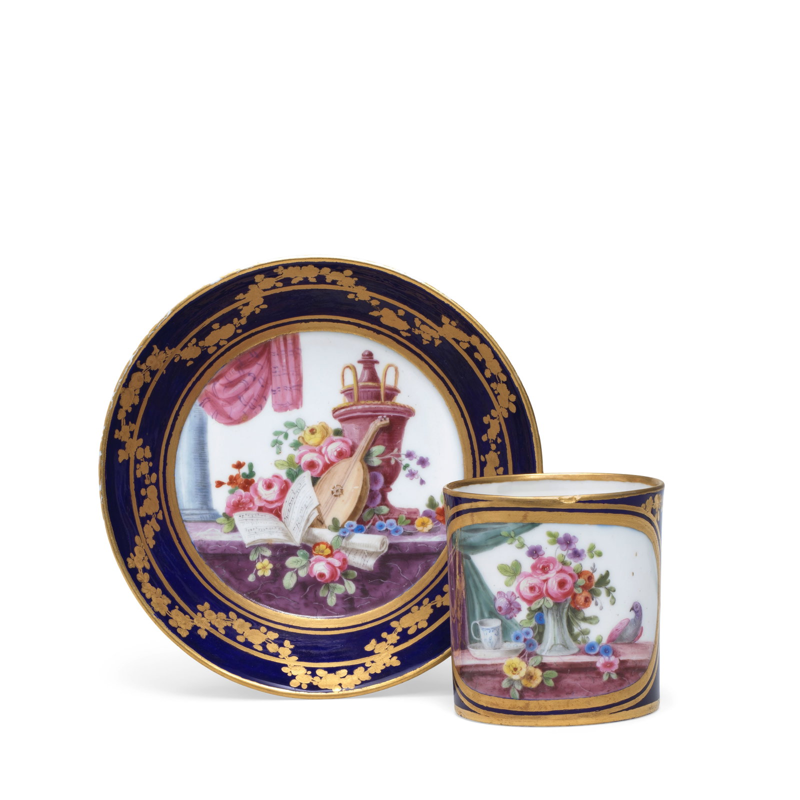 A Sèvres blue-ground cup and saucer (gobelet litron et soucoupe), dated 1776: A Sèvres blue-ground cup and saucer (gobelet litron et soucoupe), dated 1776 Of the third size, painted by Edme-François Bouillat (père) and Guillaume Noël with flower still lifes,