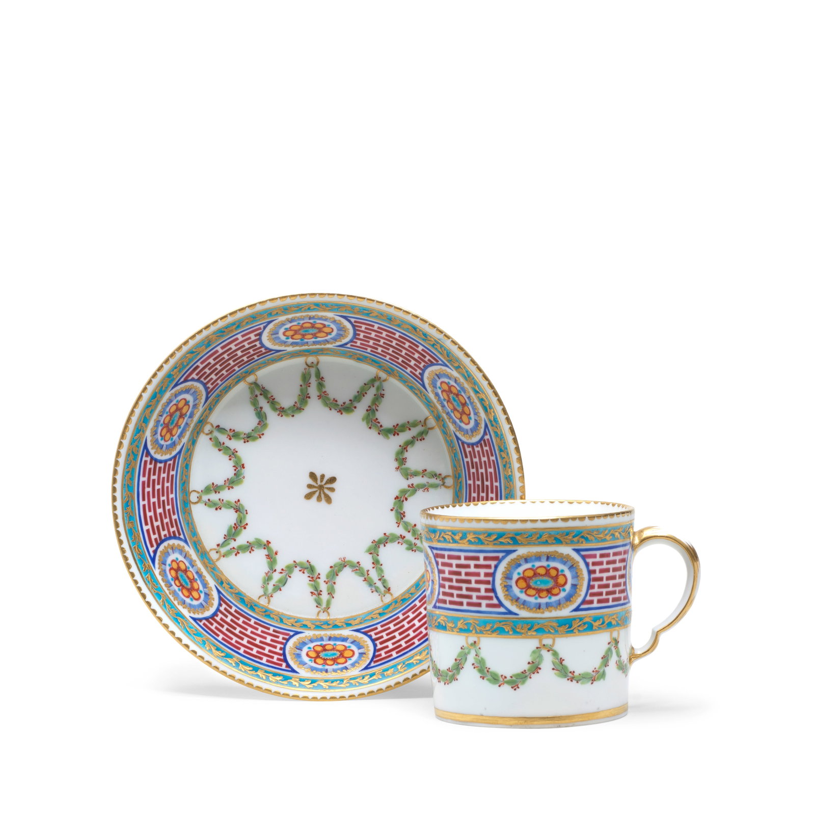 A Sèvres cup and saucer (gobelet litron et soucoupe), dated 1770: A Sèvres cup and saucer (gobelet litron et soucoupe), dated 1770 Of the second size, painted by Jean-Pierre Boulanger with a red brick-like border surrounding gilt-edged medallions enclosing flow