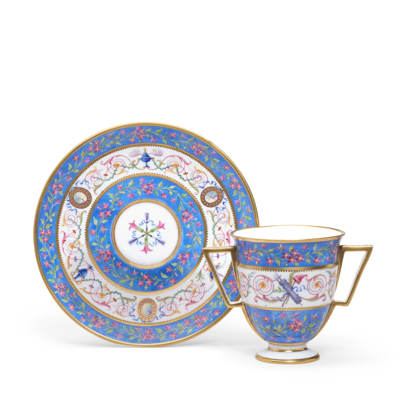 A Sèvres hard-paste porcelain revolutionary cup and saucer, dated 1791: A Sèvres hard-paste porcelain revolutionary cup and saucer, dated 1791 Painted by Cyprien-Julien Hirel de Choisy with a band of polychrome Arabesque scrollwork interspersed with urns and oval med