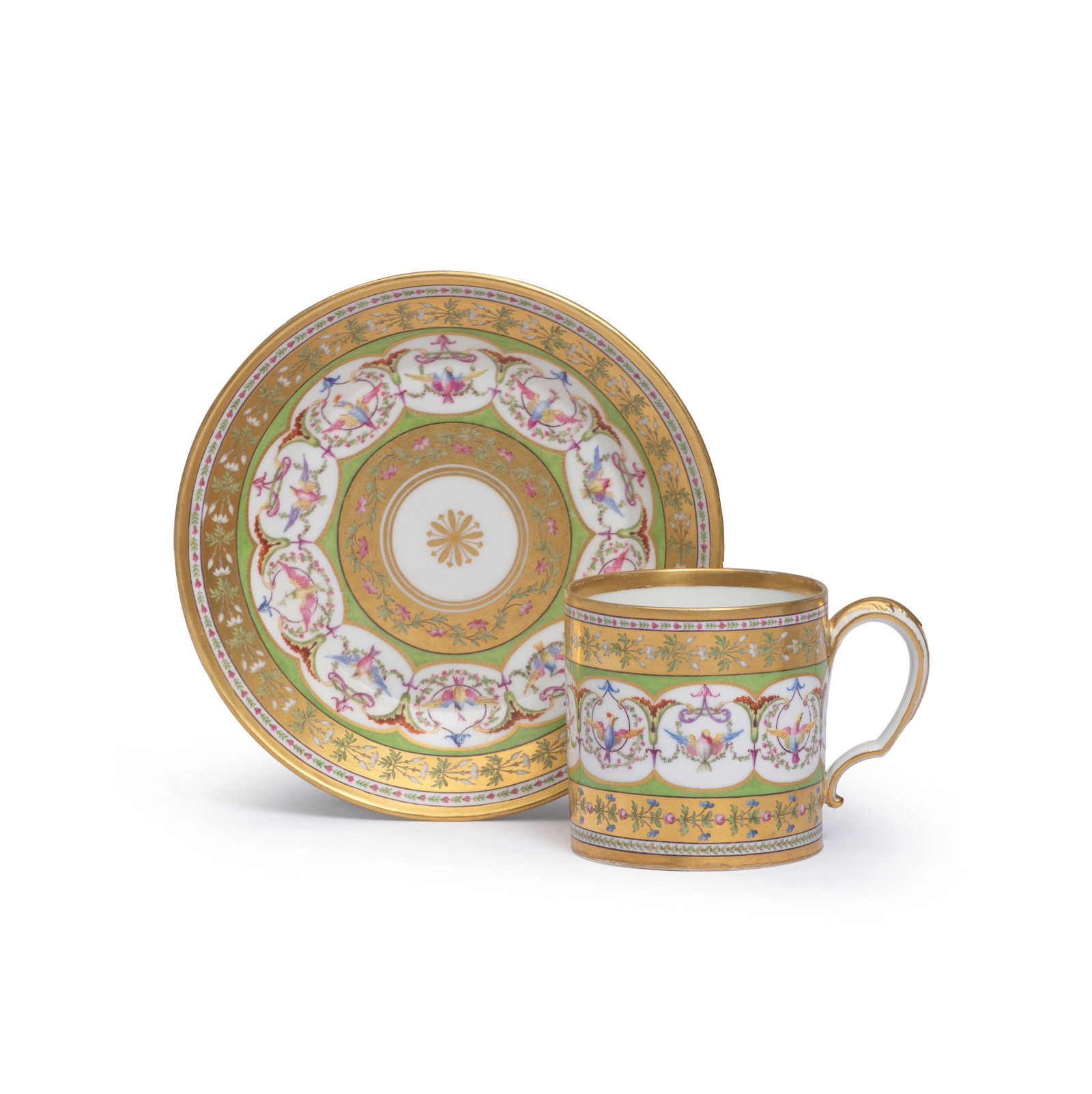 A Sèvres hard-paste porcelain cup and saucer (gobelet litron et soucoupe), dated 1786: A Sèvres hard-paste porcelain cup and saucer (gobelet litron et soucoupe), dated 1786 Of the second size, painted by Jean-Nicolas Le Bel with a green-ground border reserved with a gilt-edged undu