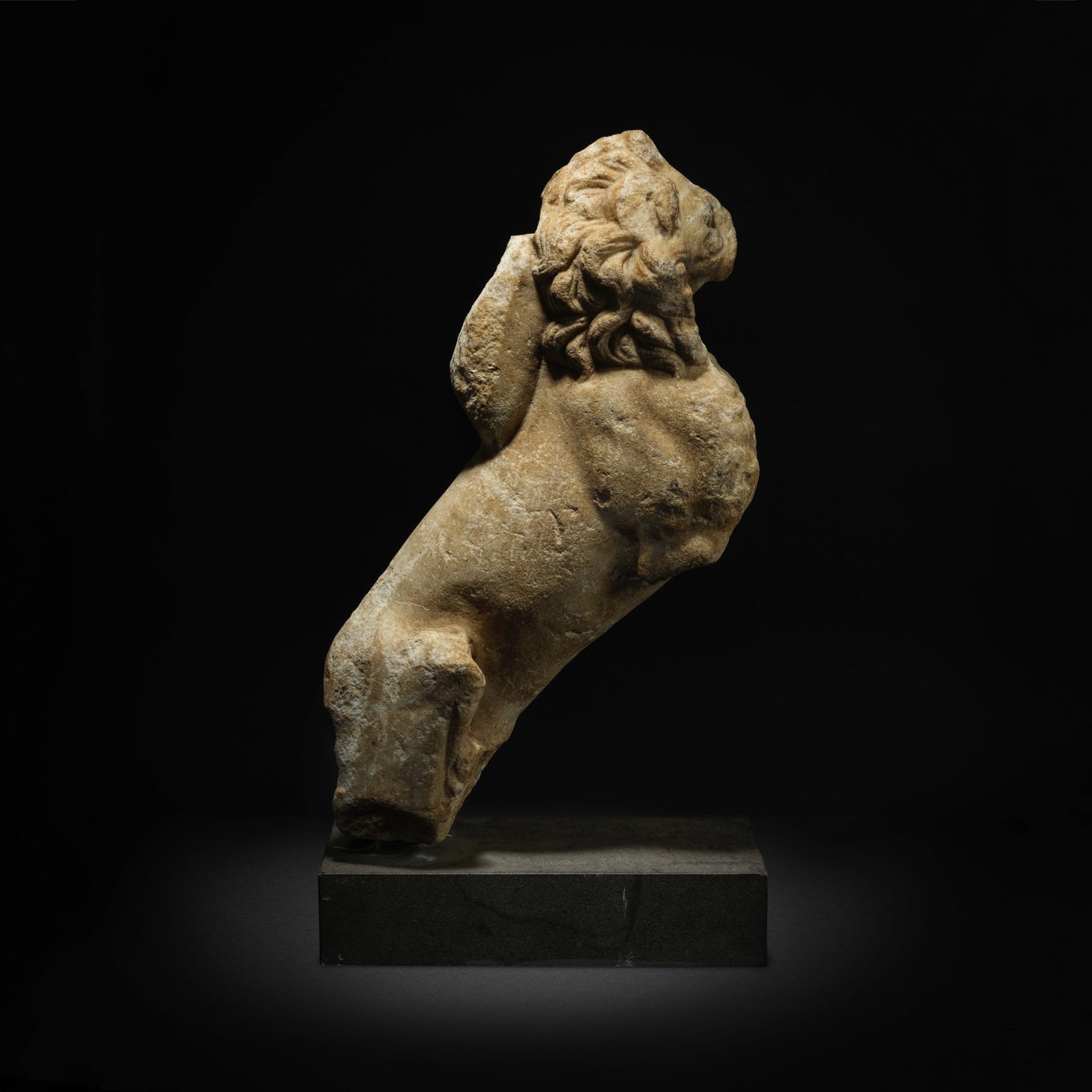 A Roman marble lion trapezophoros: A Roman marble lion trapezophoros Circa 2nd Century A.D. 59cm high Footnotes: Provenance: Wladimir Rosenbaum (1894-1984) collection, Ascona. F.H. collection, Ascona, acquired before 1984. Anonymous s
