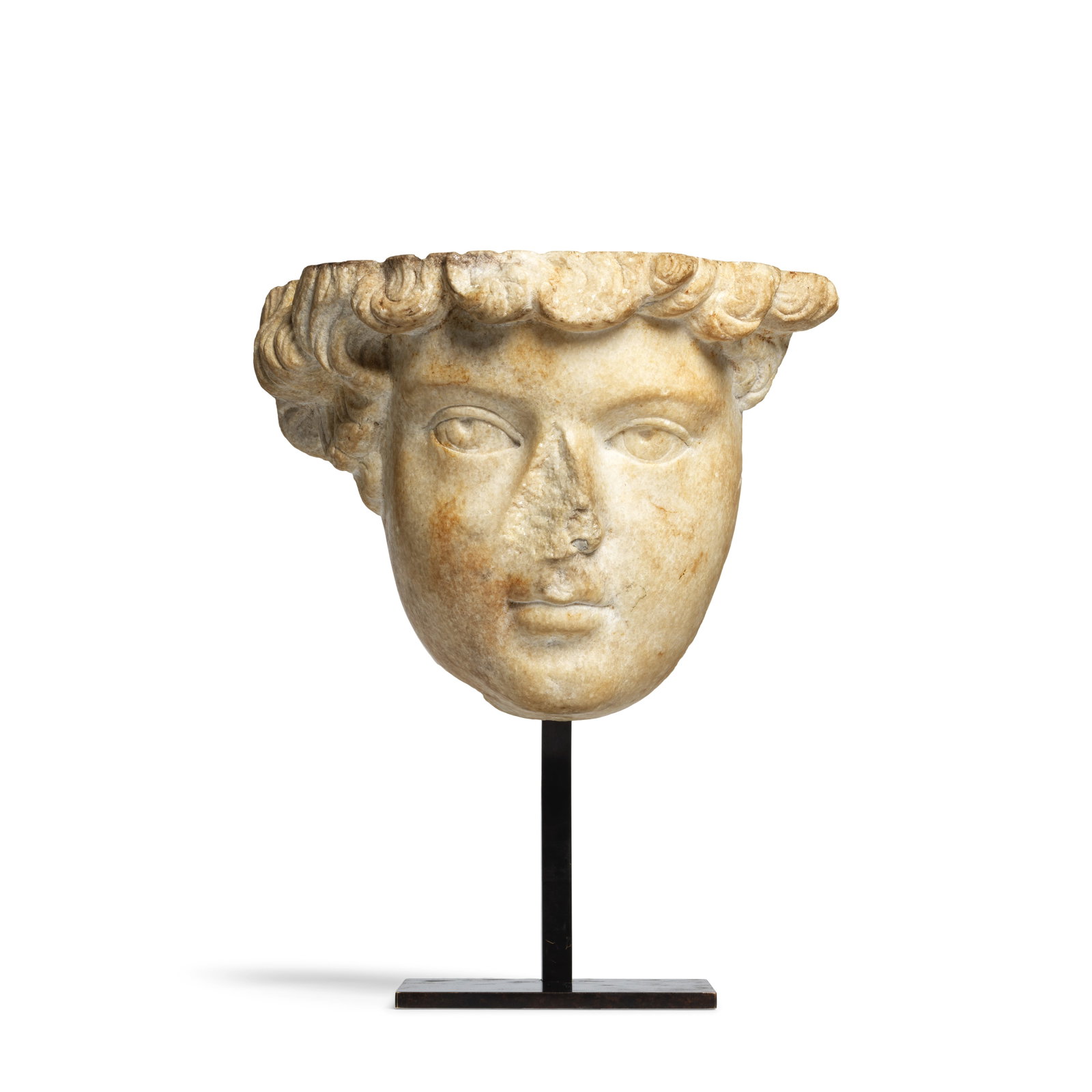 A Roman marble portrait relief, probably of the young Antinous: A Roman marble portrait relief, probably of the young Antinous Circa 2nd Century A.D. 14cm high, 19.5cm wide Footnotes: Provenance: René Withofs (1919-1997) collection, Brussels, acquired mid-20t