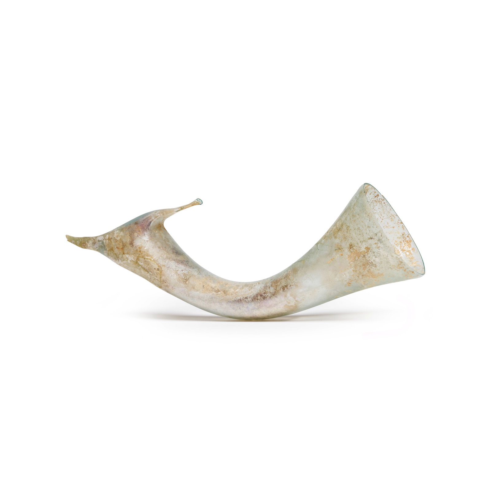 A Roman pale blue glass animal-headed rhyton: A Roman pale blue glass animal-headed rhyton Circa 1st Century A.D. 29cm long Footnotes: Provenance: Schefler Collection, New York, acquired between 1969-2000. It is possible that the head of this rhy