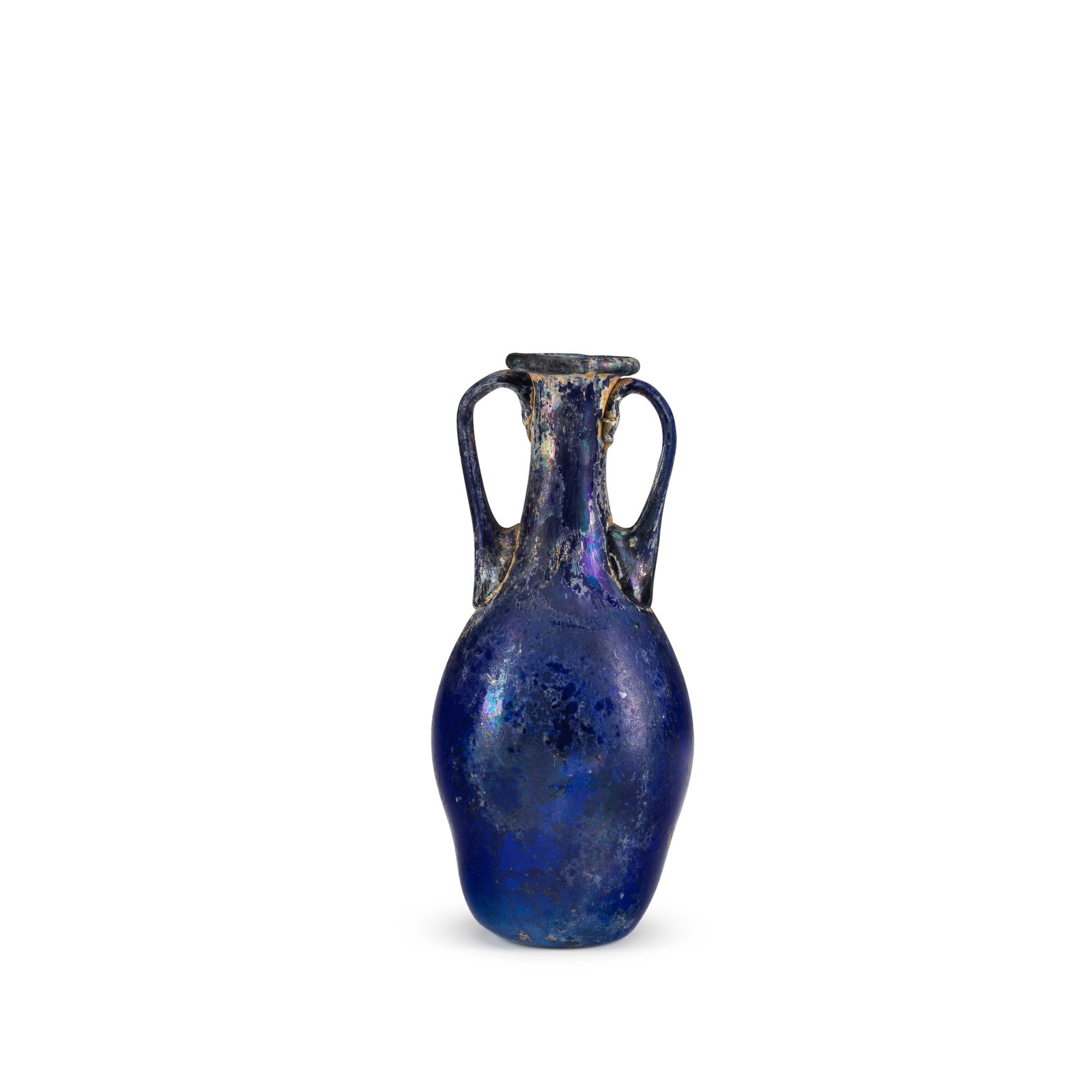 A Roman cobalt blue glass amphora: A Roman cobalt blue glass amphora Circa 1st Century A.D. 11cm high Footnotes: Provenance: with Fortuna Fine Art, New York. Schefler Collection, New York, acquired from the above 16 February 1998. This