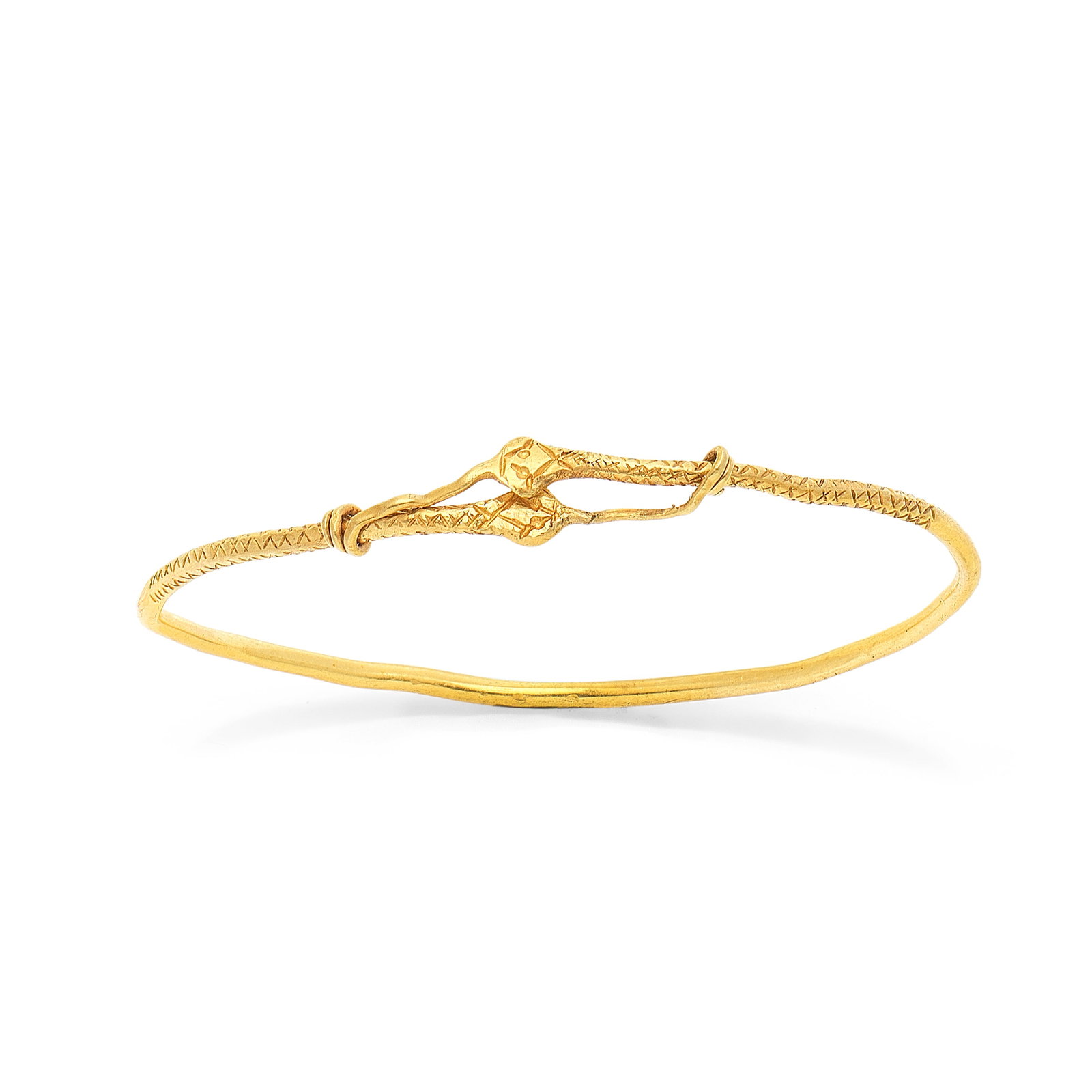 A Roman gold snake bracelet: A Roman gold snake bracelet Circa 1st Century B.C.-1st Century A.D. 6cm diam., weight 8.5g Footnotes: Provenance: UK deceased estate, formed between the 1980s and the mid-1990s. Anonymous sale; Bonham