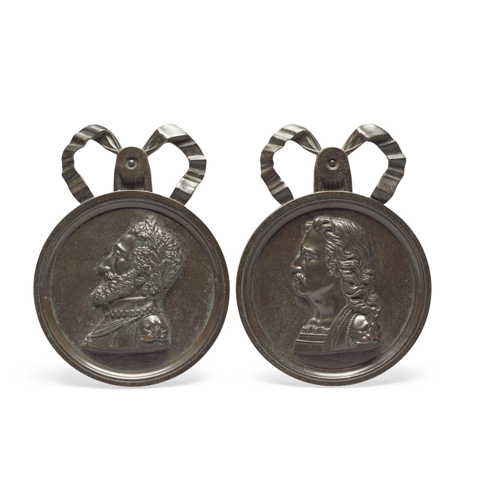 A pair of French patinated bronze profile historical portrait roundels of Henri III and Oliver C...: A pair of French patinated bronze profile historical portrait roundels of Henri III and Oliver Cromwell Probably late 18th/early 19th century The sitters both looking to sinister within moulded circul