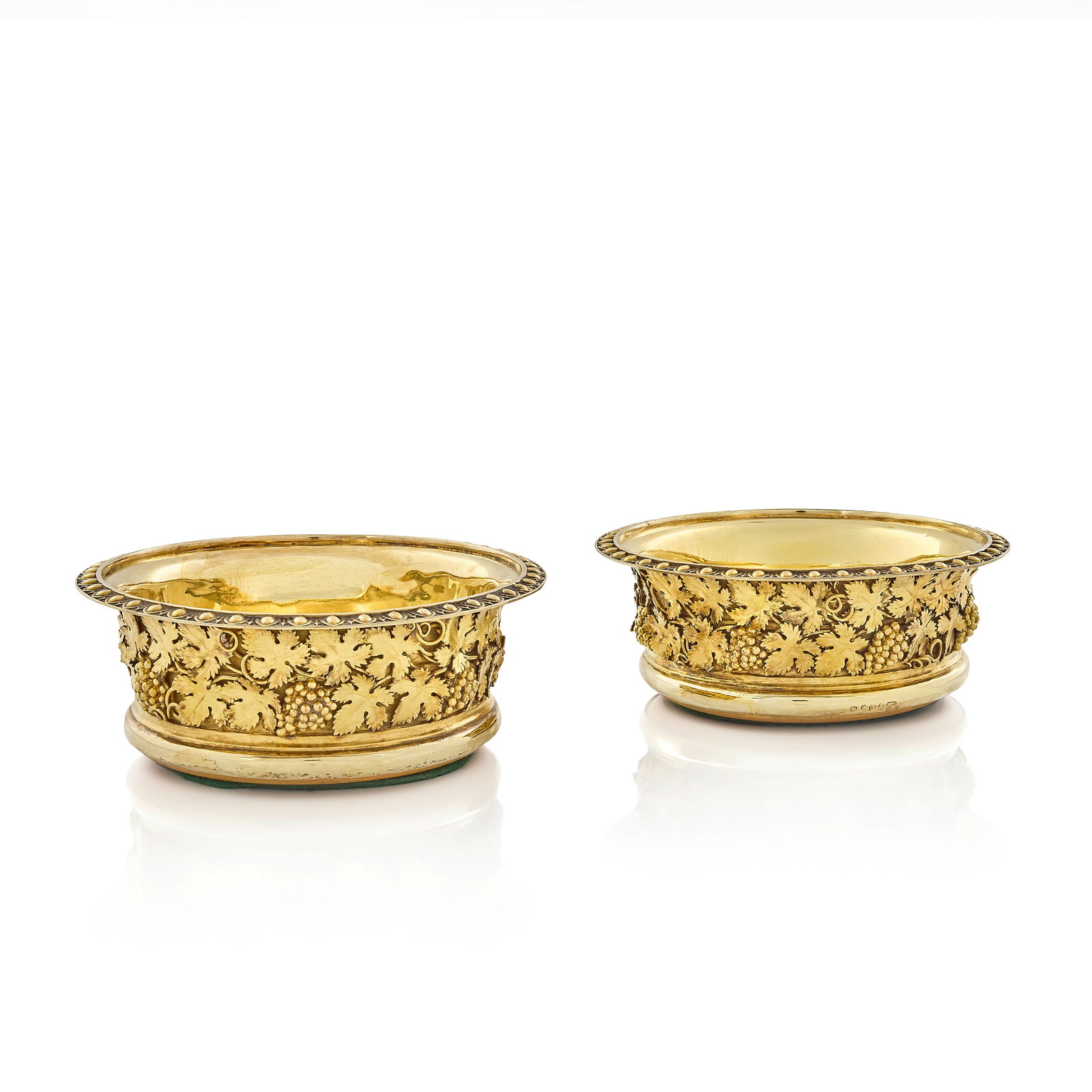 A pair of George III silver-gilt wine coasters Joseph William Storey or J W Story and William E... (1 of 1)