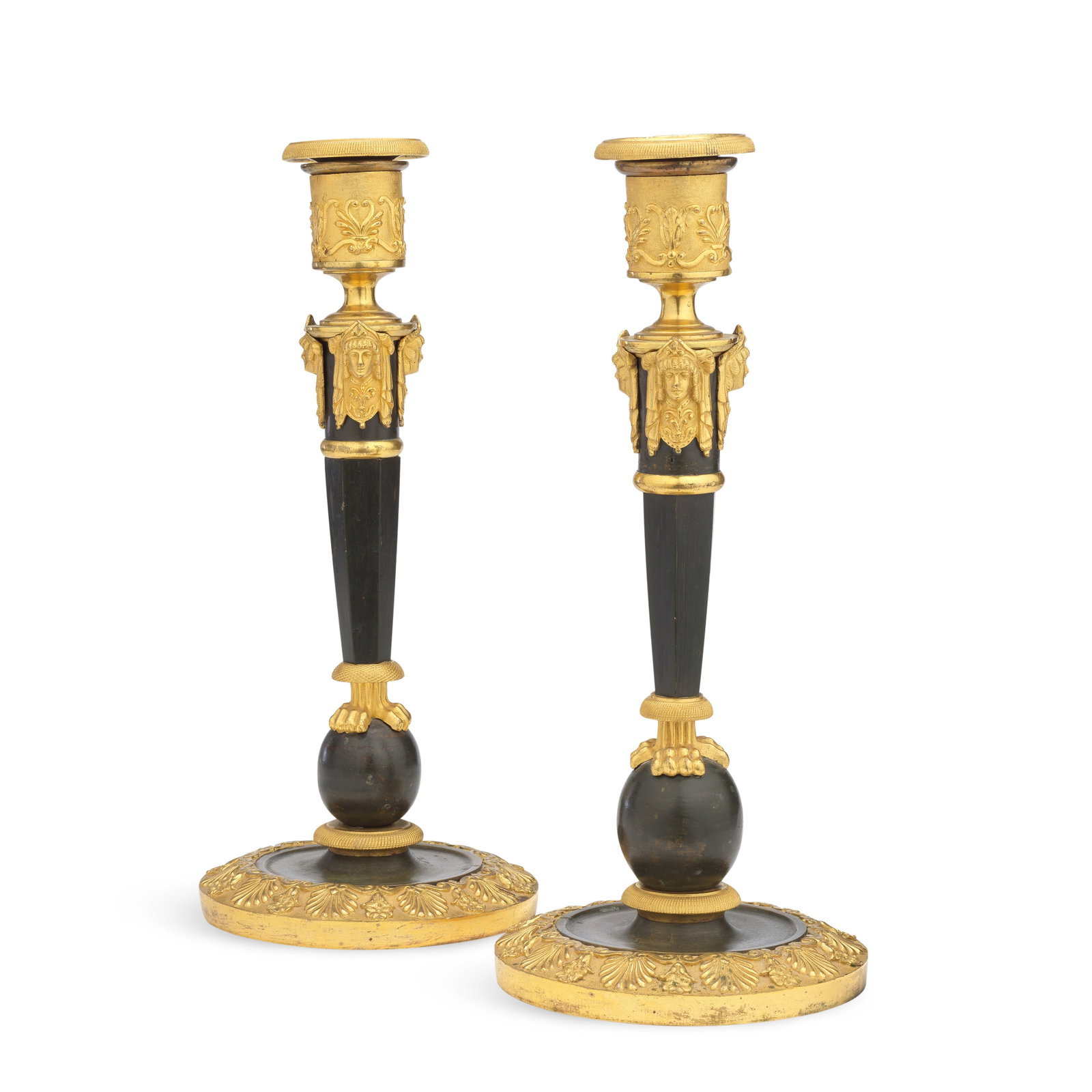 A pair of large early 19th century French gilt and patinated bronze candlesticks In the manner o... (1 of 1)
