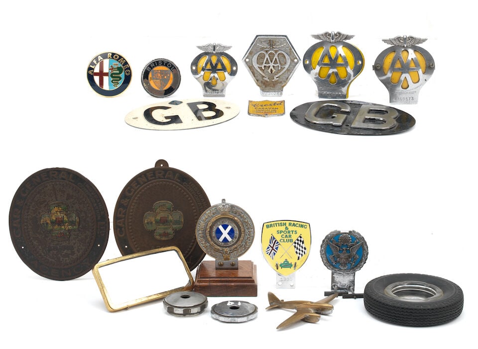 Badges and other automobilia, ((Qty)): Badges and other automobilia, including British Racing & Sports Car Club, number 1330; Royal Scottish Automobile Club, number P830, on wooden stand; an 'E Pluribus Unum' American crest badge by Gaunt;