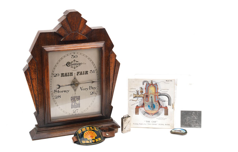 An AC 'Britain's Leading Light Car' compensated mantlepiece barometer, ((6)) (1 of 3)