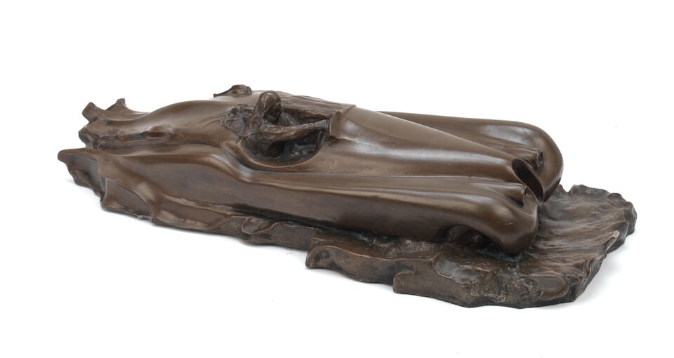 A cold-cast bronze Art-Deco inspired sculpture of a Jaguar XK120,: A cold-cast bronze Art-Deco inspired sculpture of a Jaguar XK120, modern, cold-cast resin and bronze composite, 70cm long. Lot to be sold without reserve. For further information on this lot please vi