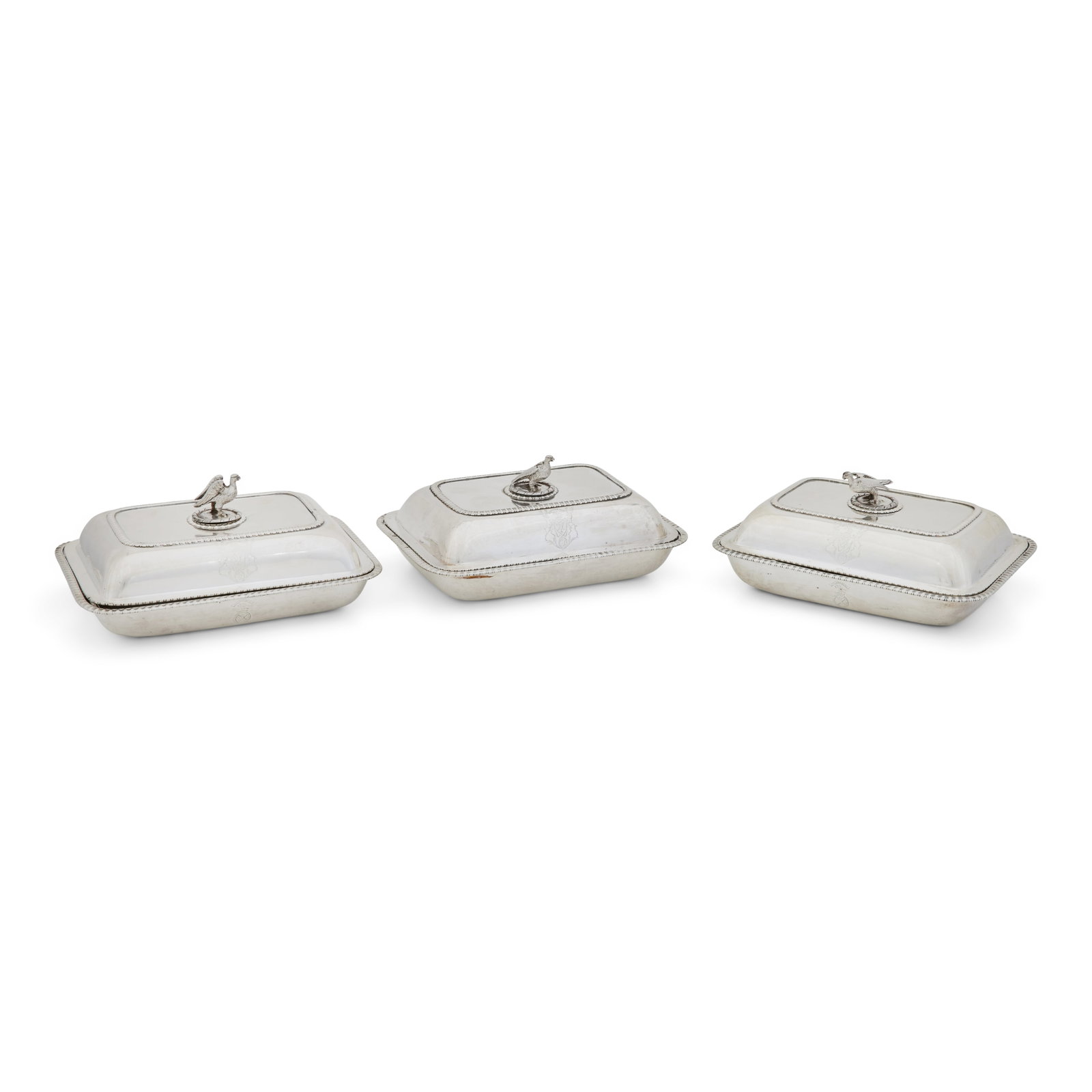 A set of four George III silver entrée dishes and covers by Emes & Barnard, London 1808 (4): A set of four George III silver entrée dishes and covers by Emes & Barnard, London 1808 Rectangular with gadrooned rims, engraved with the Maxwell arms, the handles formed as swans, (the fourth e