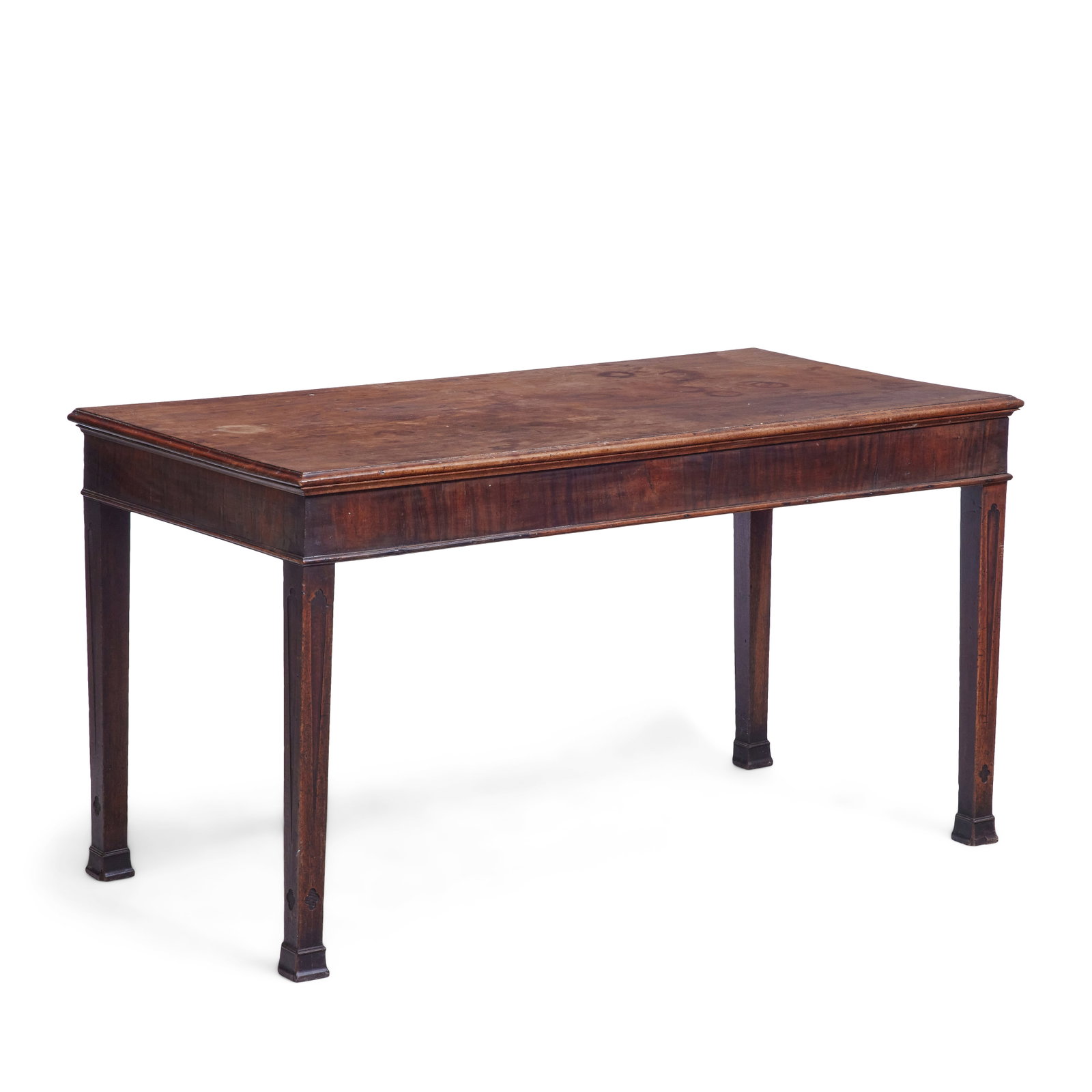 A George II mahogany side or serving table Mid-18th century: A George II mahogany side or serving table Mid-18th century The rectangular top above a plain frieze on moulded square tapering legs and block feet, 152cm wide x 75cm deep x 81.5cm high, (59 1/2in wid