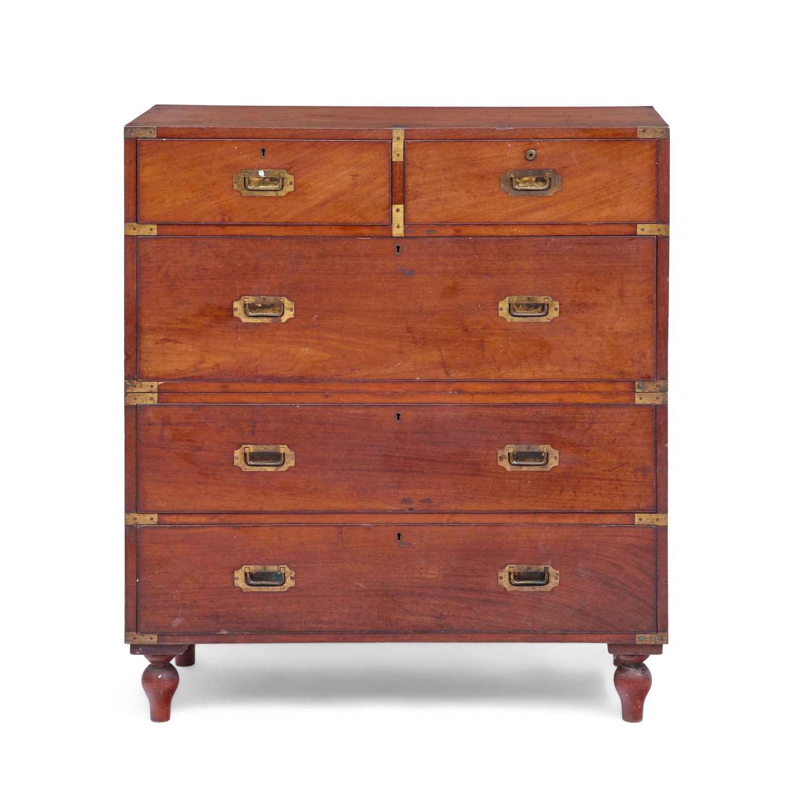 A Victorian mahogany campaign chest Mid-19th century, by Hill & Millard: A Victorian mahogany campaign chest Mid-19th century, by Hill & Millard Constructed in two halves, the upper section fitted with a pair of short drawers, above a long drawer, the lower section with tw
