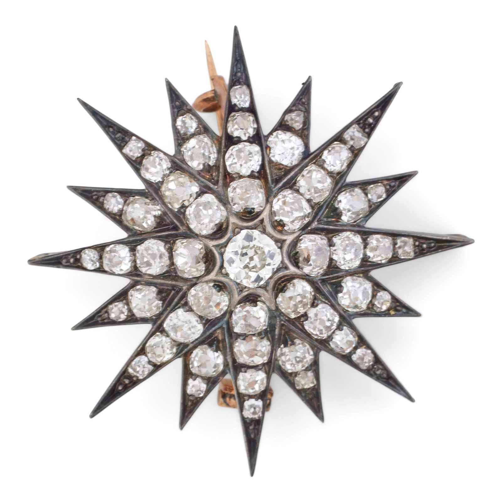 A diamond star brooch, circa 1890: A diamond star brooch, circa 1890 Set throughout with cushion shaped, old brilliant and single cut diamonds, diamonds approximately 3.50 to 4.00 carats total, 4.0cm diameter. For further information o
