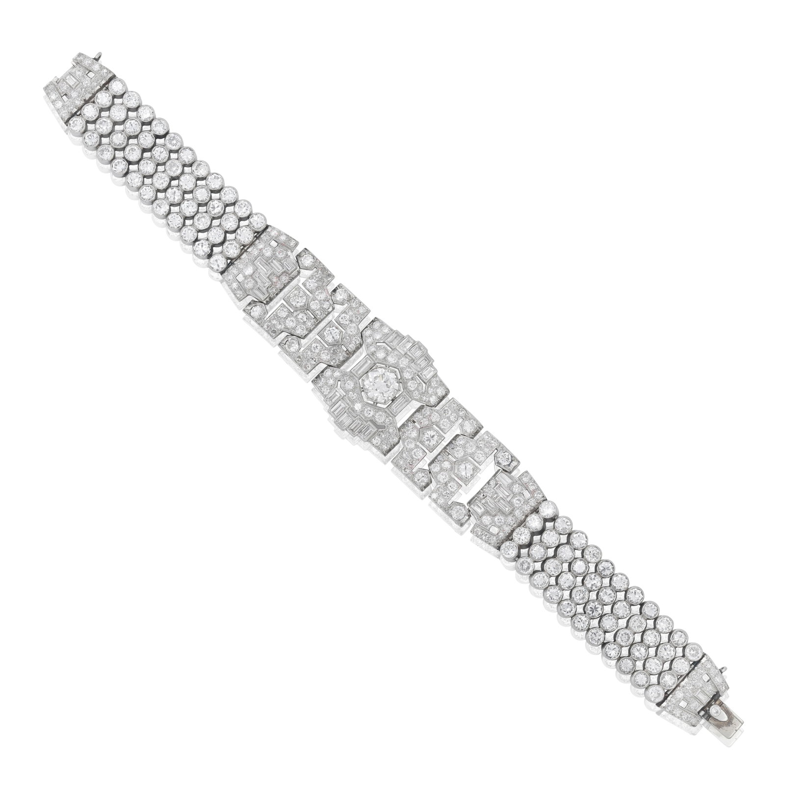 DIAMOND STRAP BRACELET, CIRCA 1940: DIAMOND STRAP BRACELET, CIRCA 1940 The articulated panels of geometric design, set with brilliant, single and baguette-cut diamonds, between four rows of brilliant-cut diamonds, principal diamond very