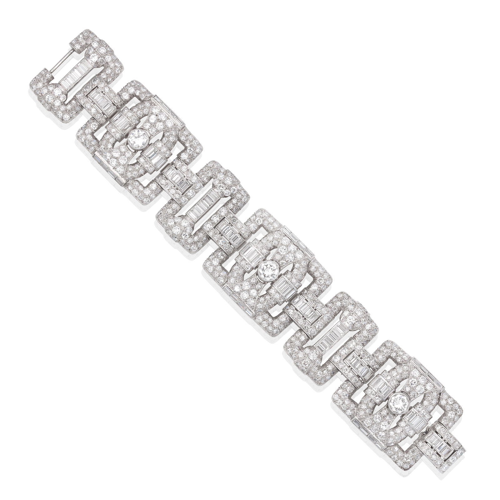 DIAMOND STRAP BRACELET, CIRCA 1930: DIAMOND STRAP BRACELET, CIRCA 1930 The geometric openwork links of buckle form, set throughout with old brilliant, single and baguette-cut diamonds, mounted in platinum, French assay marks, diamonds a