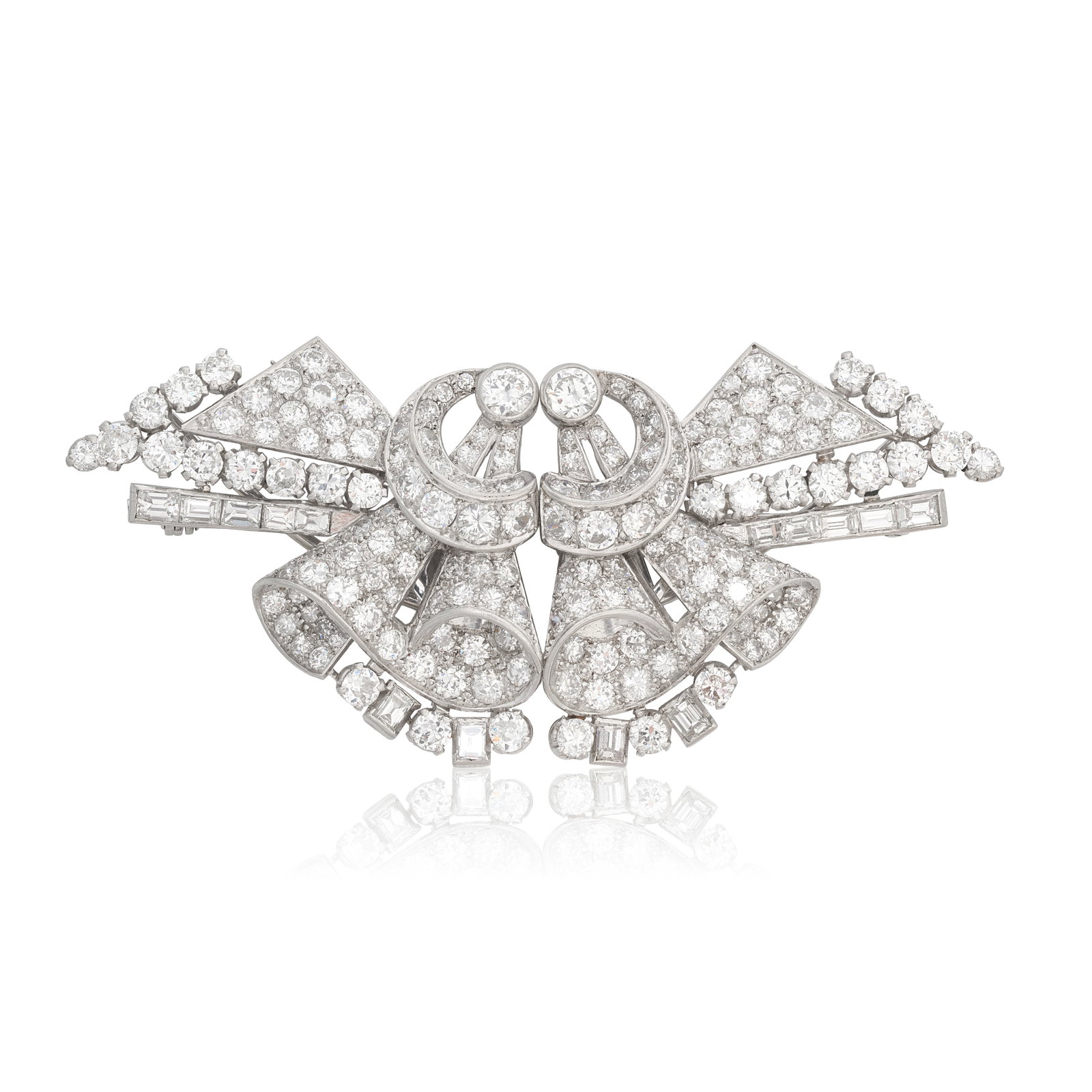 DIAMOND DOUBLE CLIP BROOCH, CIRCA 1950: DIAMOND DOUBLE CLIP BROOCH, CIRCA 1950 Designed as stylised bouquets between geometric shoulders, set throughout with old brilliant and baguette-cut diamonds, diamonds approx. 10.50cts total, length 7