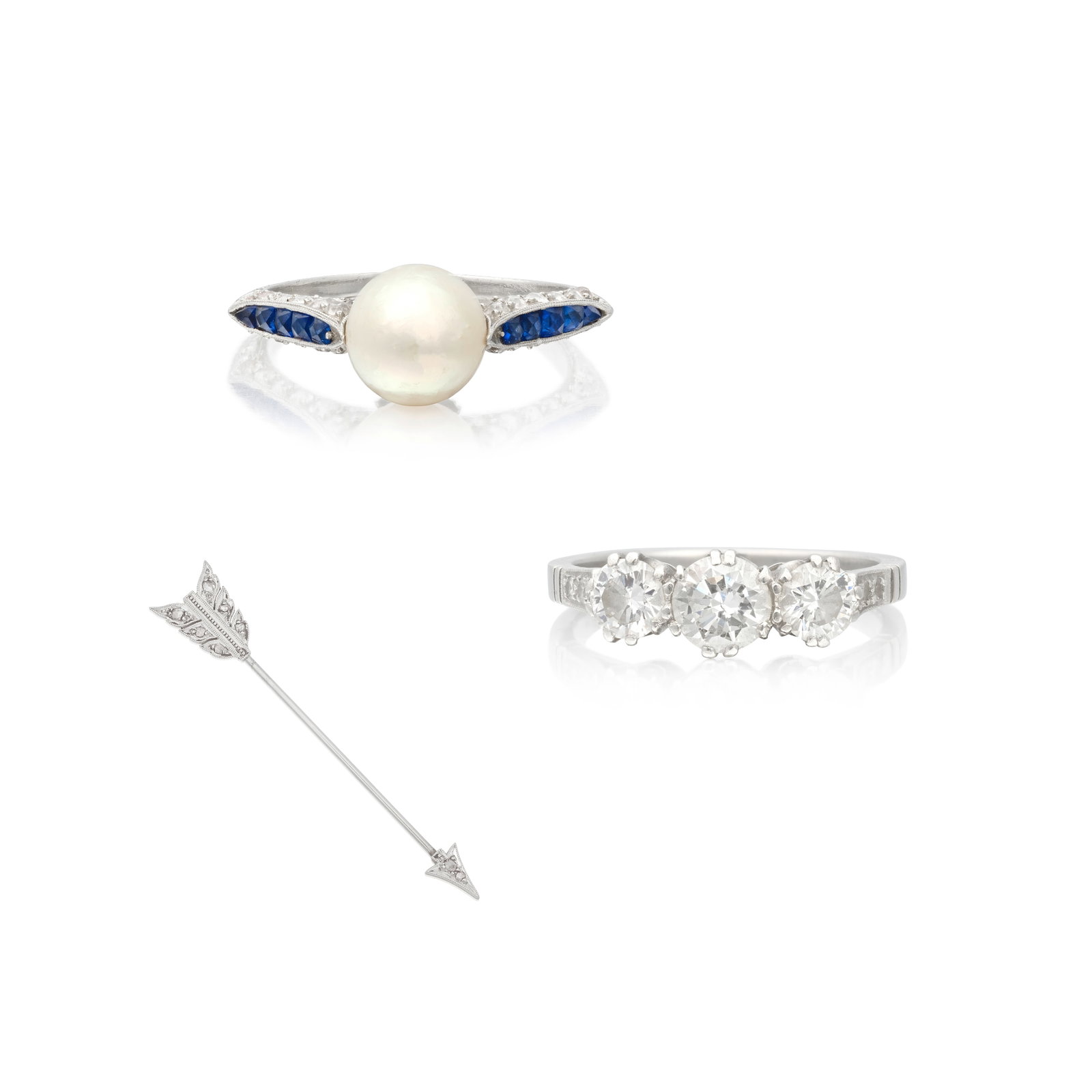 TWO RINGS AND A DIAMOND-SET JABOT PIN (3): TWO RINGS AND A DIAMOND-SET JABOT PIN 1st: Set with three brilliant-cut diamonds between single-cut diamond shoulders, 2nd: The 7.2mm cultured pearl between French-cut sapphire and old brilliant-cut d