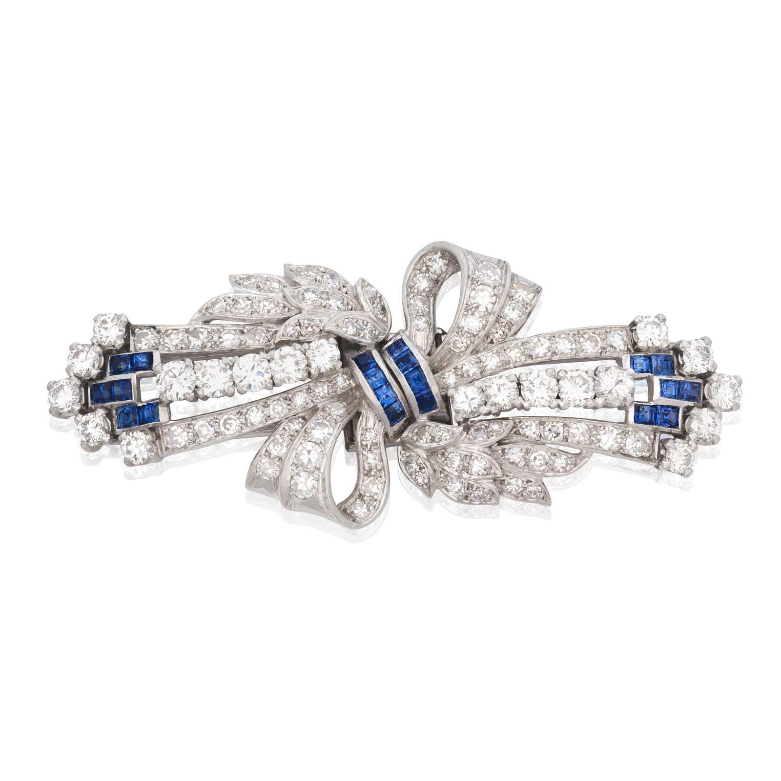 SAPPHIRE AND DIAMOND DOUBLE CLIP BROOCH: SAPPHIRE AND DIAMOND DOUBLE CLIP BROOCH The asymmetrical ribbon bow with foliate motifs, set with brilliant and single-cut diamonds, accented by step-cut sapphires, diamonds approx. 2.30cts total, len