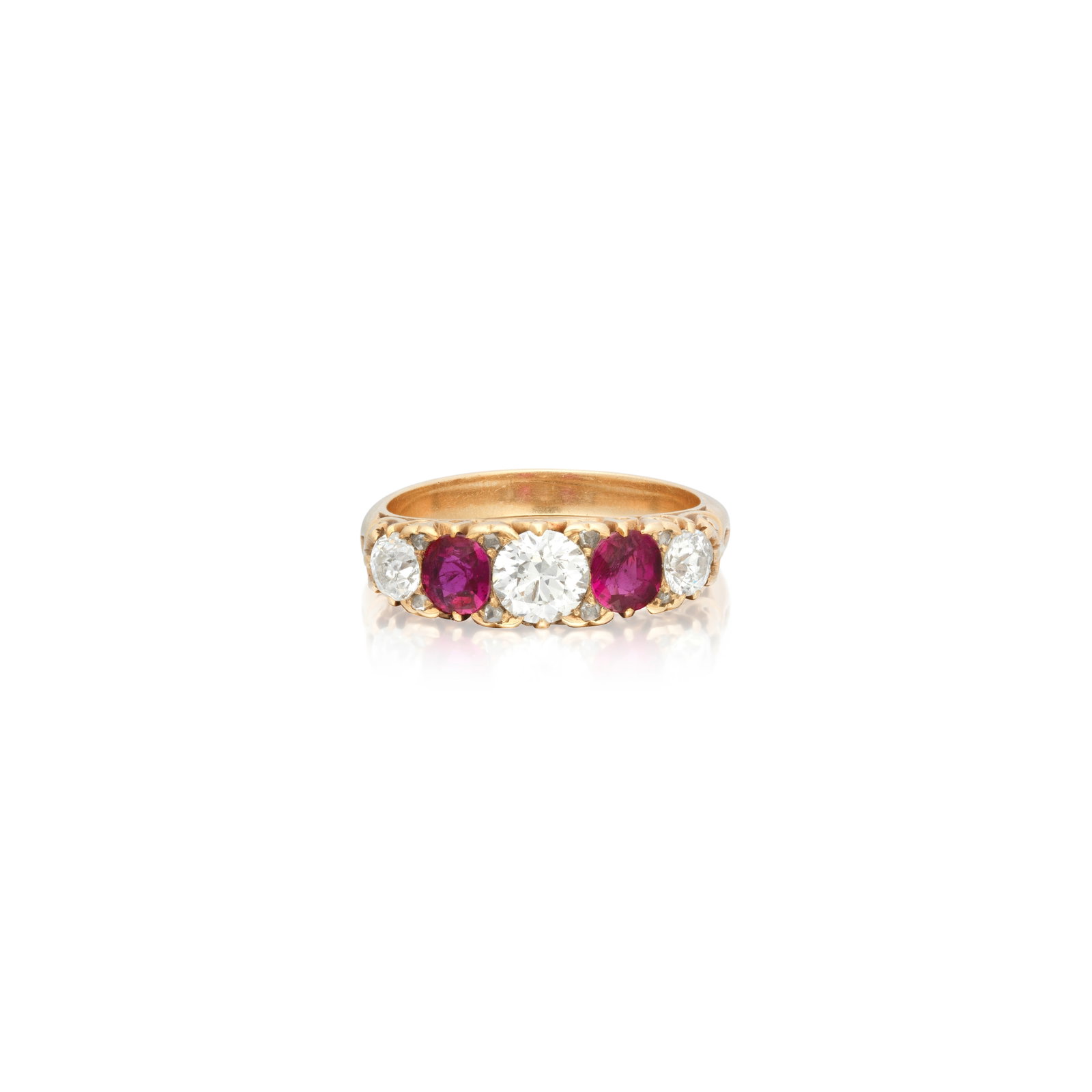 DIAMOND AND RUBY FIVE-STONE RING, CIRCA 1890: DIAMOND AND RUBY FIVE-STONE RING, CIRCA 1890 The old brilliant-cut diamonds between circular-cut rubies, accented by rose-cut diamonds, to a carved scroll gallery, mounted in gold, diamonds approx. 0.
