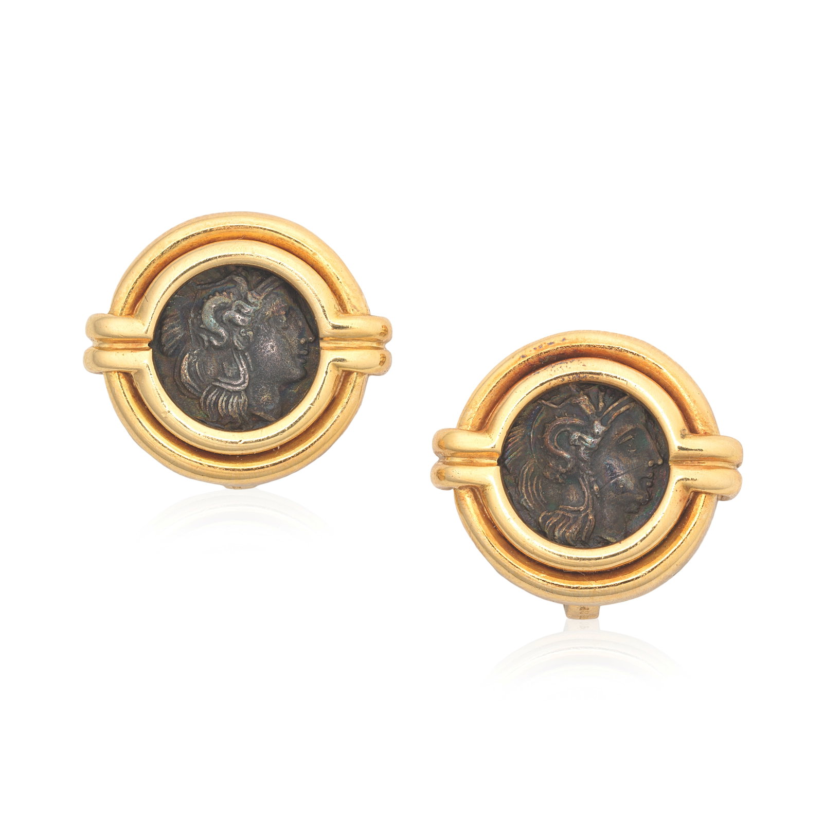 BULGARI: 'MONETE' EARCLIPS, CIRCA 1994: BULGARI: 'MONETE' EARCLIPS, CIRCA 1994 Each ancient coin set within a reeded circular surround, engraved to verso CALABRIA-TARENT.VT1, 4th cent. B.C., mounted in 18 carat gold, signed Bulgari, maker's