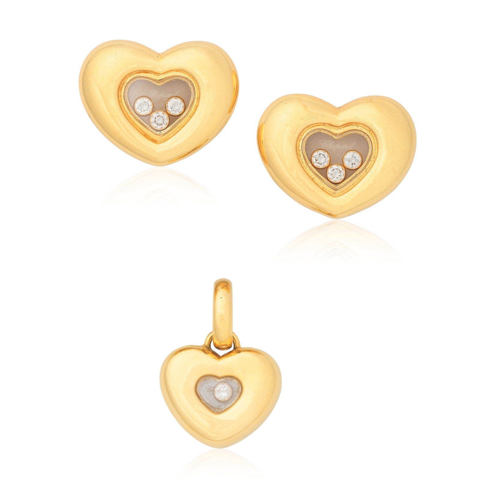 CHOPARD: DIAMOND-SET 'HAPPY DIAMONDS' EARRING AND PENDANT SUITE (2): CHOPARD: DIAMOND-SET 'HAPPY DIAMONDS' EARRING AND PENDANT SUITE Each glazed compartment containing 'floating' brilliant-cut diamonds, signed Chopard, numbered, earrings with Swiss assay mark and Conve