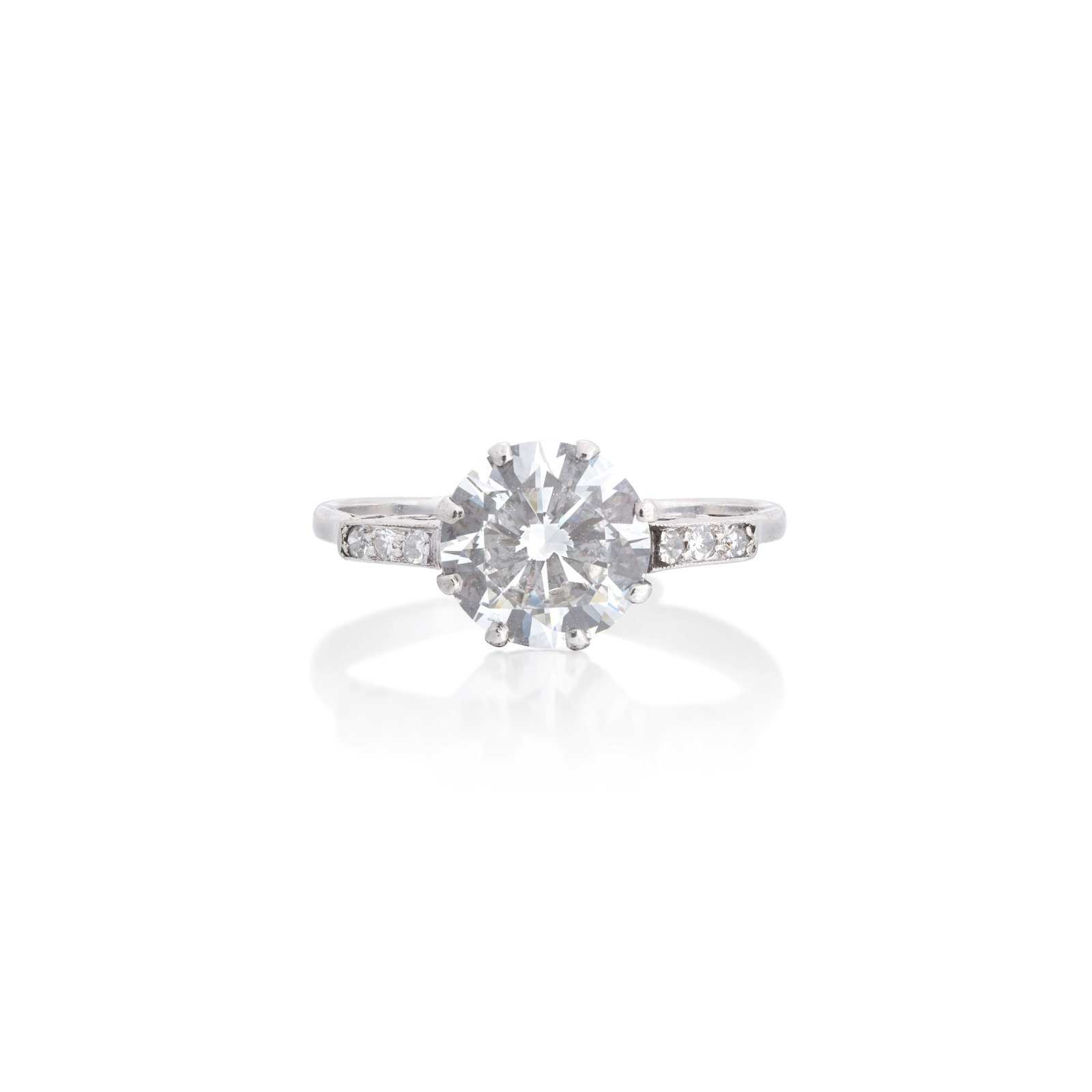 DIAMOND SINGLE-STONE RING: DIAMOND SINGLE-STONE RING The brilliant-cut diamond weighing 2.68 carats, between single-cut diamond shoulders, ring size approx. U For further information on this lot please visit Bonhams.com
