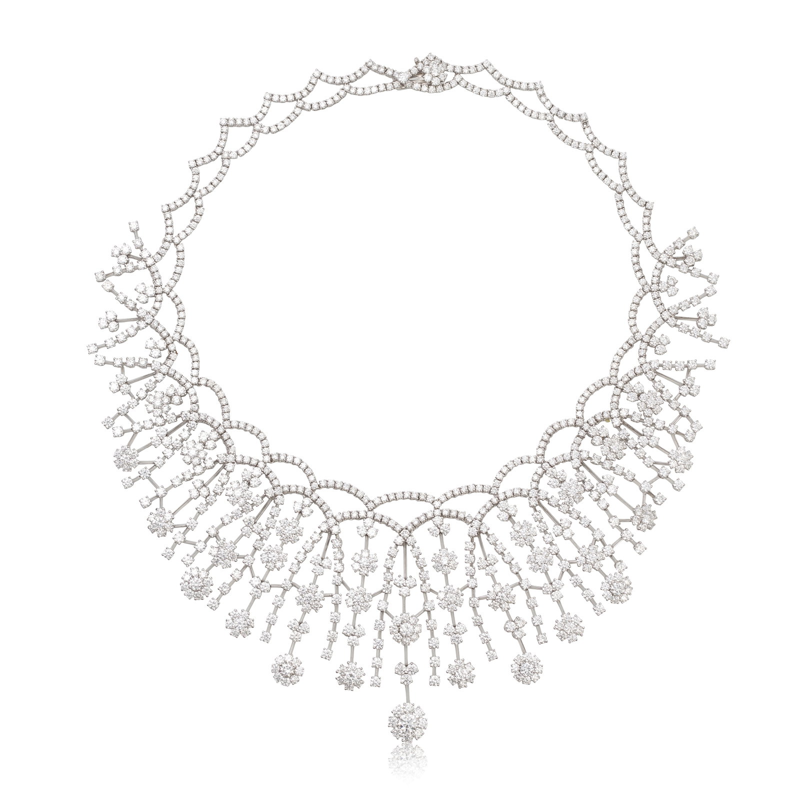 DIAMOND FRINGE NECKLACE: DIAMOND FRINGE NECKLACE Of undulating design, comprising trefoils and clusters of brilliant-cut diamonds, to knifewire linking, accented by further brilliant-cut diamonds, diamonds approx. 54.10cts to