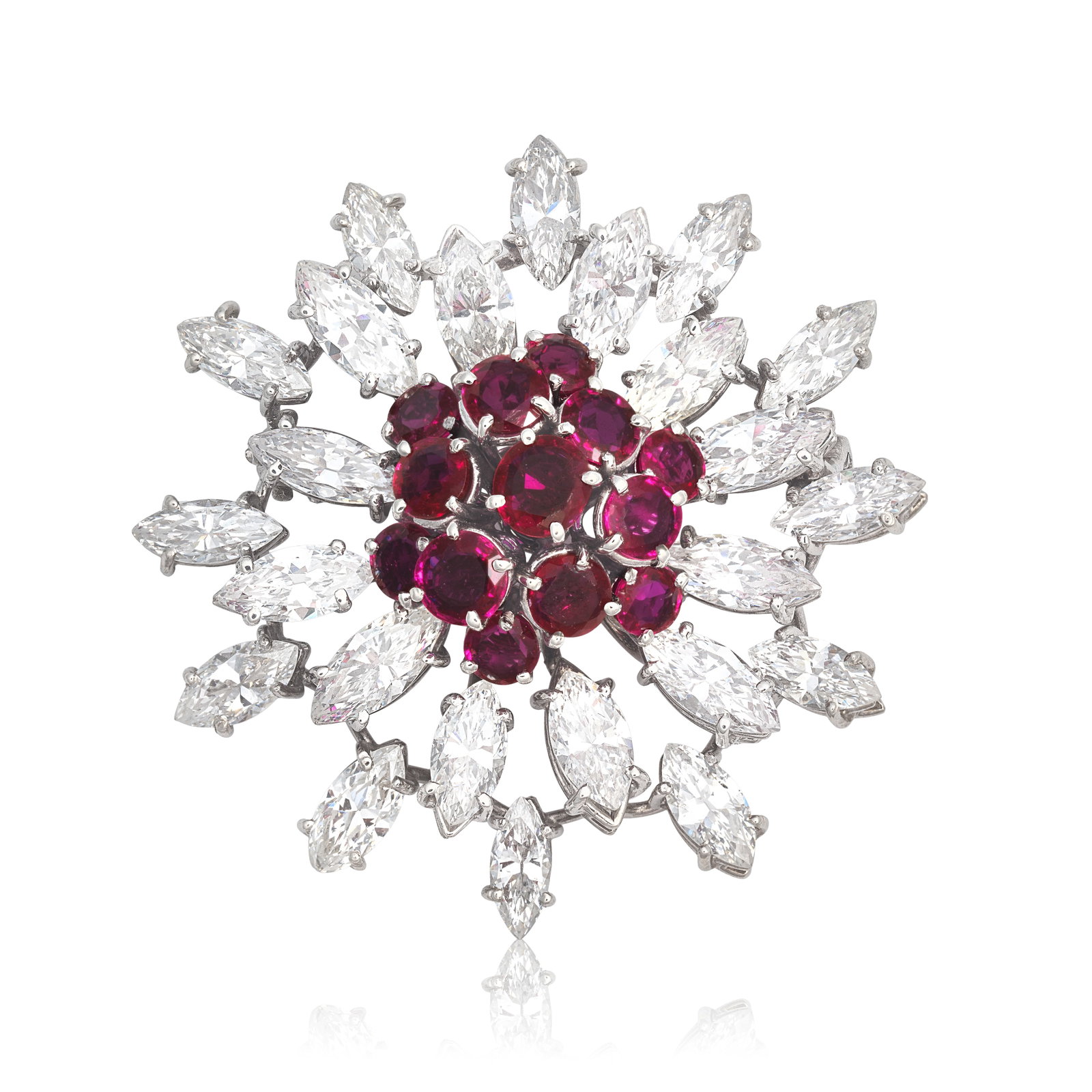 RUBY AND DIAMOND FLOWER BROOCH: RUBY AND DIAMOND FLOWER BROOCH The circular-cut rubies within a radiating surround of marquise-cut diamonds, diamonds approx. 4.60cts total, length 3.7cm For further information on this lot please vis