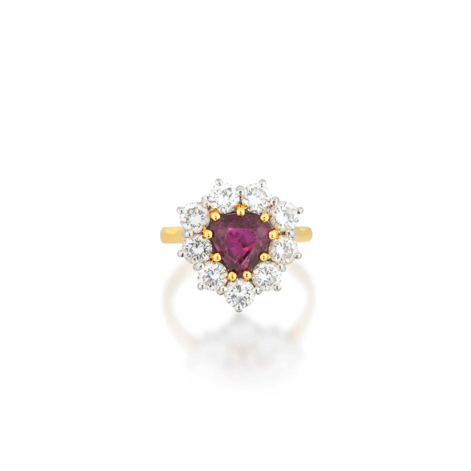 RUBY AND DIAMOND RING, 1988: RUBY AND DIAMOND RING, 1988 The pear-shaped ruby set within a brilliant-cut diamond surround, mounted in 18 carat gold, UK hallmark, diamonds approx. 1.80cts total, ring size approx. P½ For furth