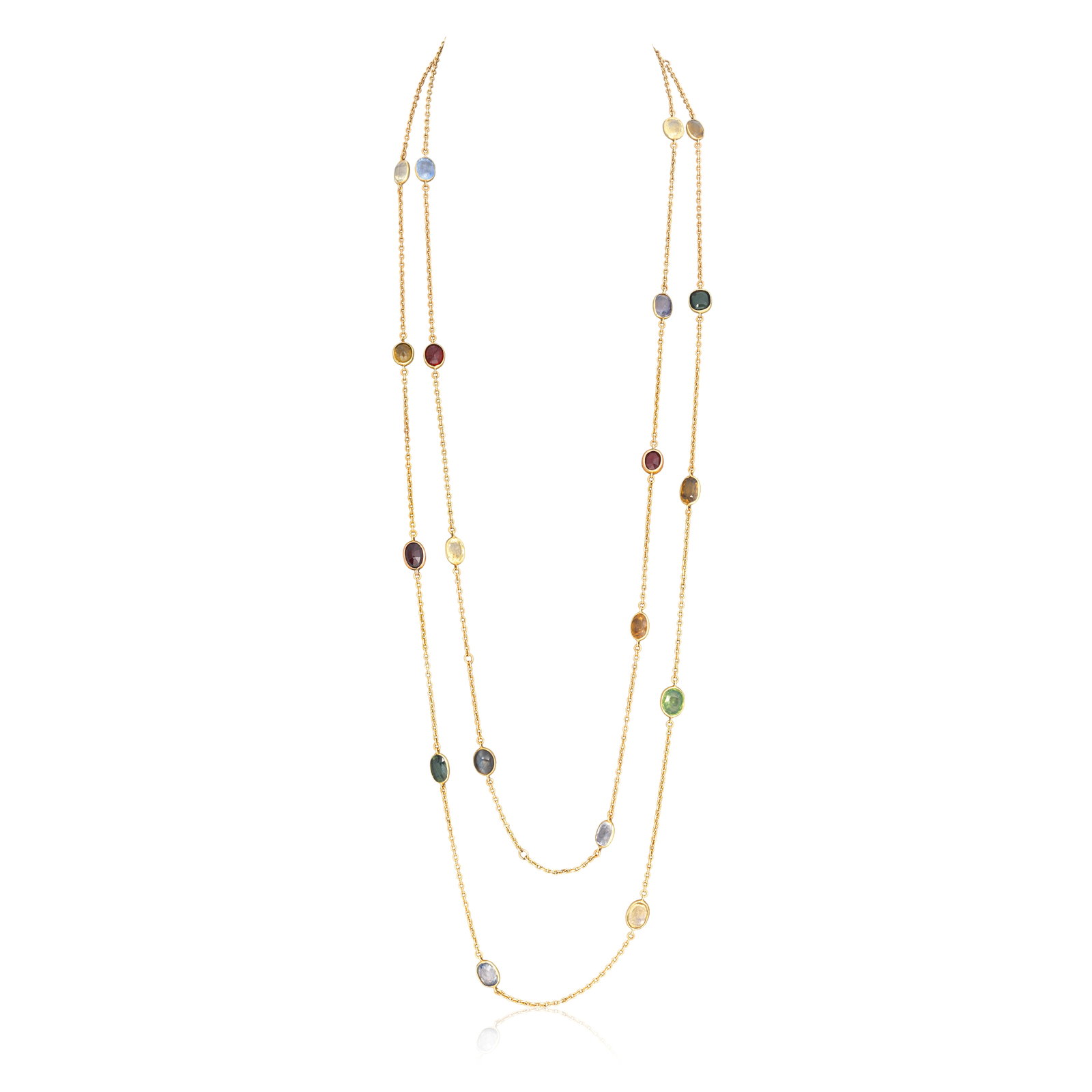 GEM-SET LONGCHAIN, CIRCA 1895: GEM-SET LONGCHAIN, CIRCA 1895 The spectacle-set chain comprising old cushion and oval-cut yellow and green sapphires, tourmalines and garnets, length 83.0cm when worn For further information on this l