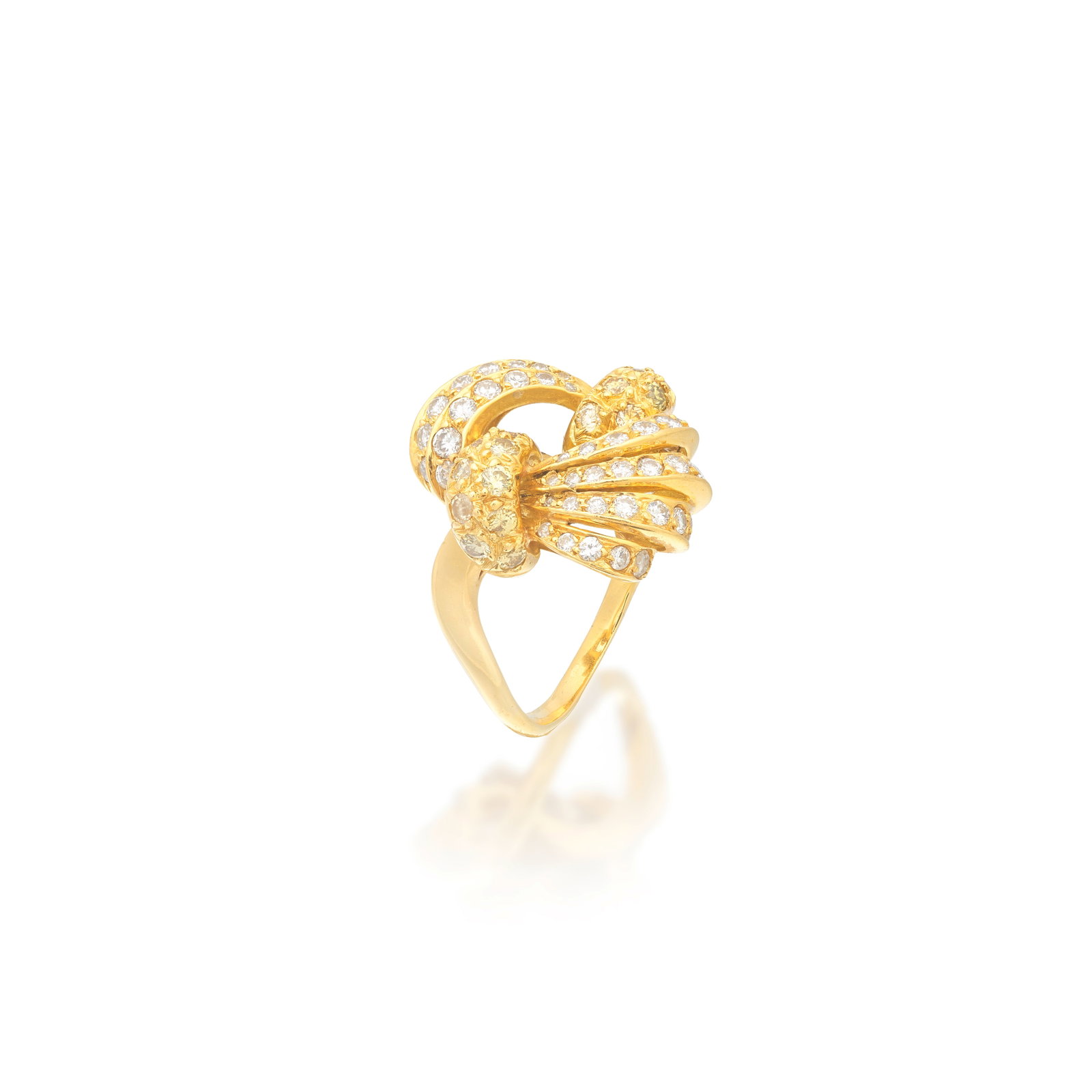 DIAMOND AND COLOURED DIAMOND RING: DIAMOND AND COLOURED DIAMOND RING Of openwork form, pavé-set with brilliant-cut diamonds, the bombé shoulders set with similarly-cut diamonds of yellow tint, diamonds approx. 1.15cts total, 