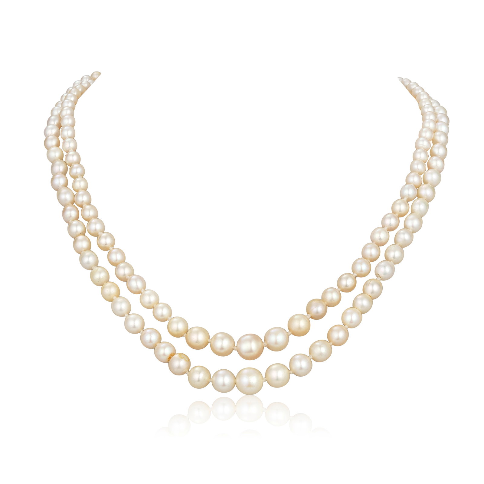 NATURAL PEARL NECKLACE WITH DIAMOND CLASP: NATURAL PEARL NECKLACE WITH DIAMOND CLASP The two rows of 3.0 - 7.6mm natural pearls to a clasp set with an old cushion-cut diamond within a surround of old single-cut diamonds, longest row with one i