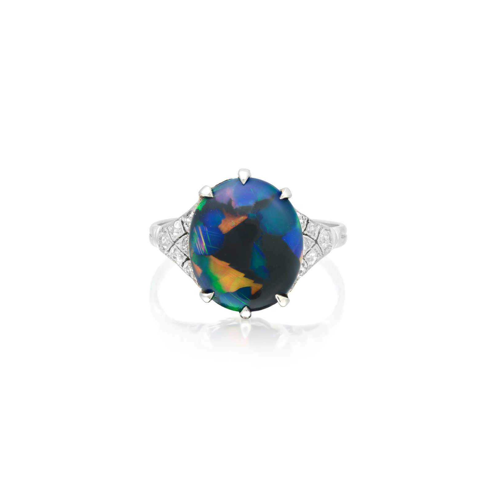 ATTRIBUTED TO LIBERTY: BLACK OPAL AND DIAMOND RING, CIRCA 1915: ATTRIBUTED TO LIBERTY: BLACK OPAL AND DIAMOND RING, CIRCA 1915 The cabochon black opal, weighing 2.79 carats, between pierced shoulders set with single-cut diamonds, mounted in platinum, partial maker