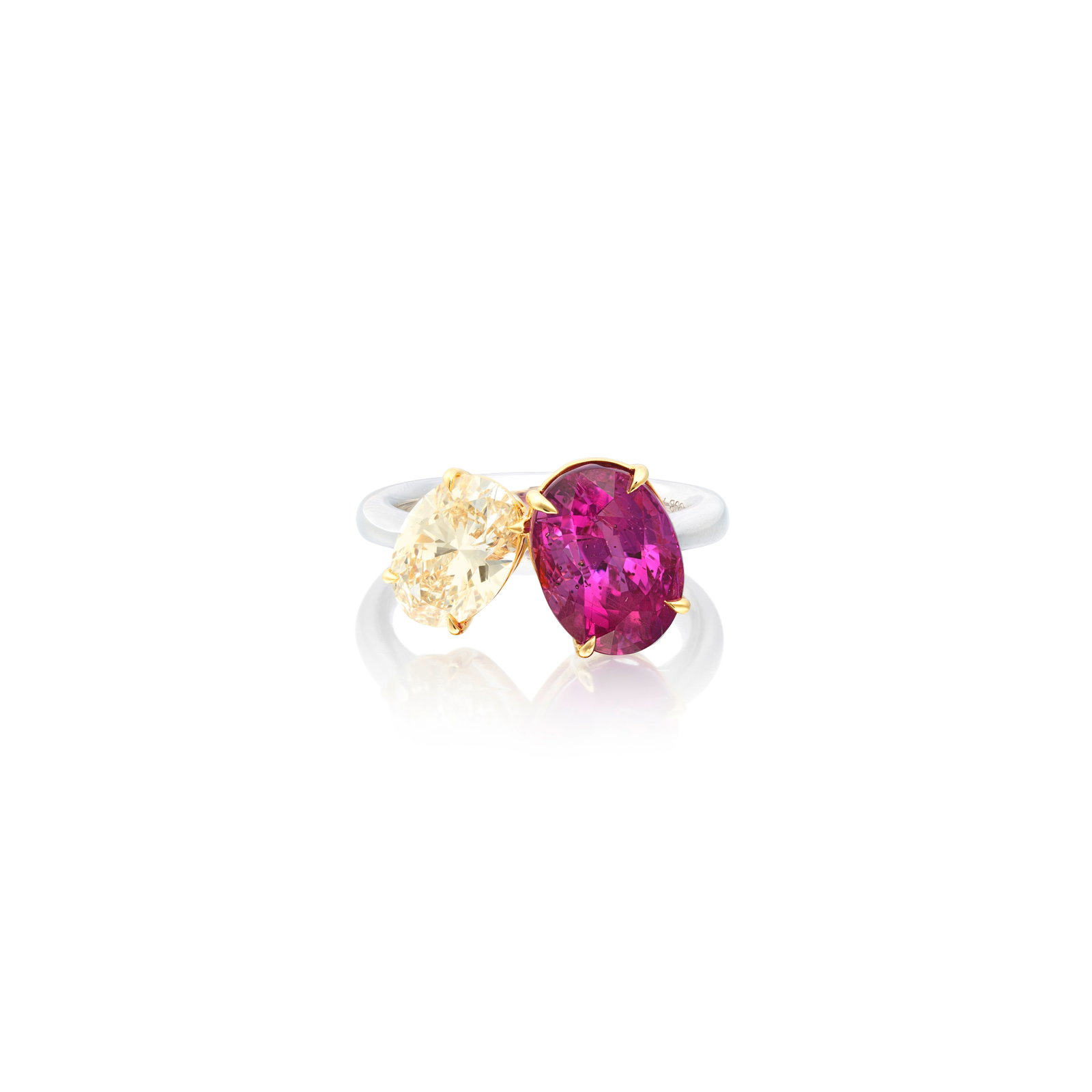 PINK SAPPHIRE AND DIAMOND RING: PINK SAPPHIRE AND DIAMOND RING The oval-cut pink sapphire weighing 5.06 carats, obliquely set with an oval-cut diamond, weighing 1.52 carats, ring size L½ Footnotes: Gübelin: Pink sapphire w