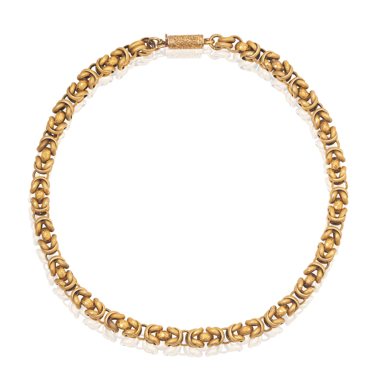 GOLD CHAIN, 19TH CENTURY: GOLD CHAIN, 19TH CENTURY The gold links decorated in low relief, interlocking in a knot style linking, length 41.5cm For further information on this lot please visit Bonhams.com